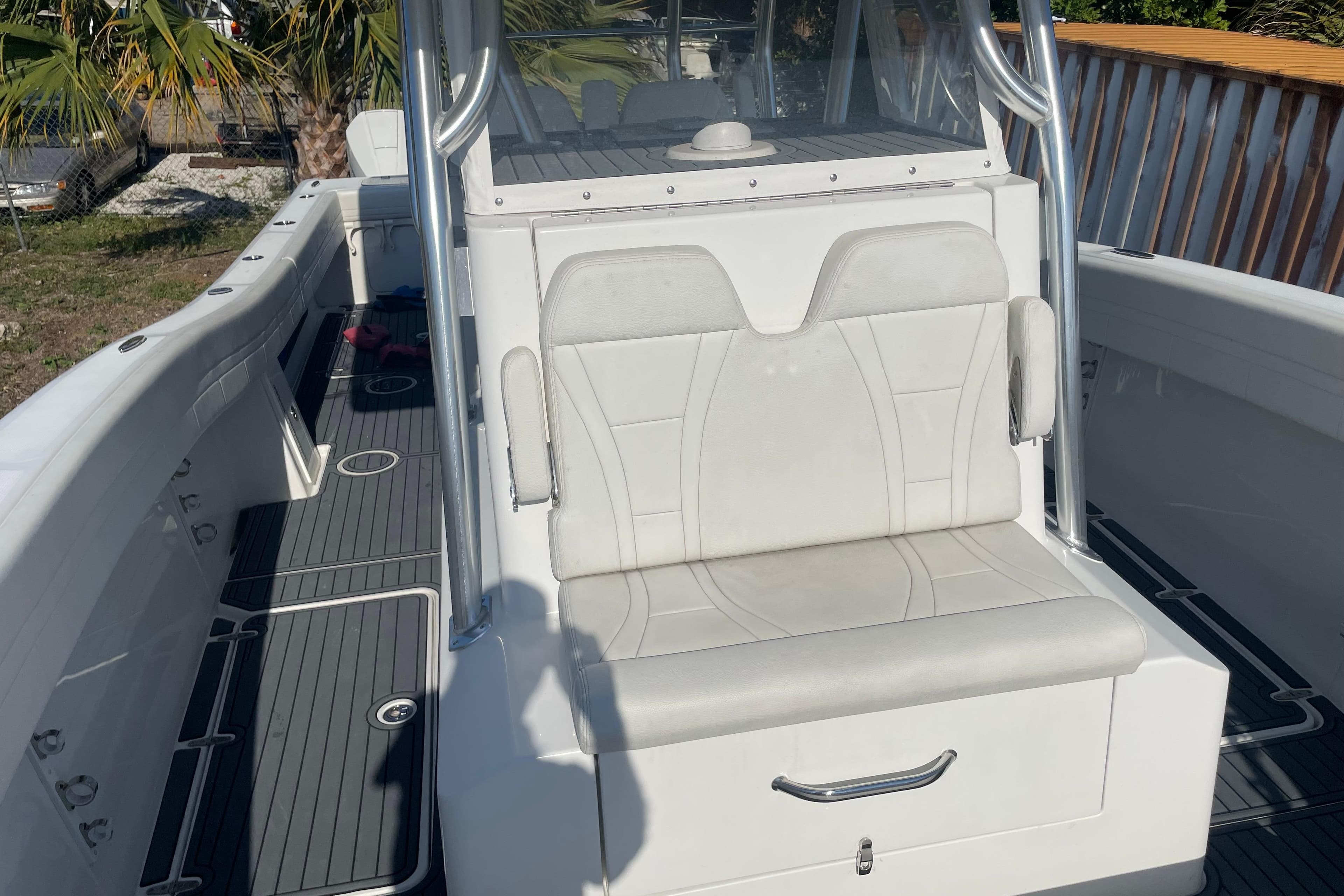 2022 Prowler 31 boat interior with white seating and sleek design.