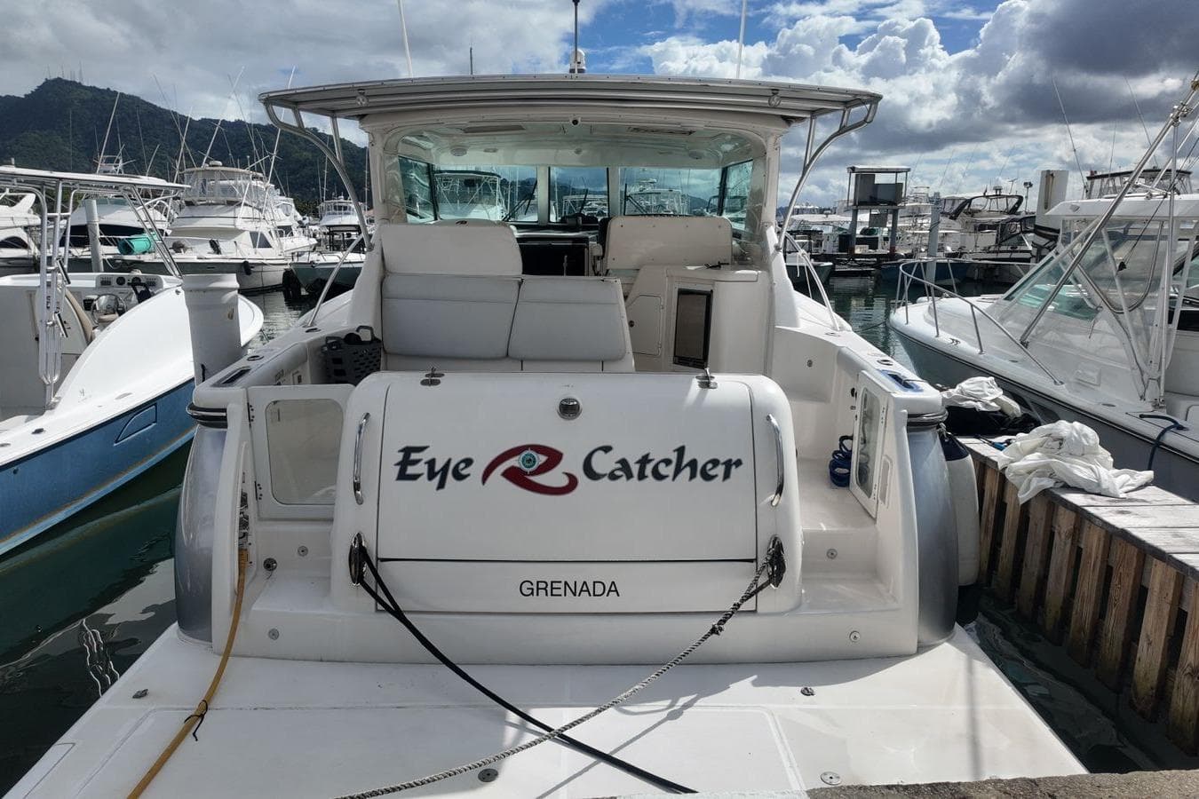 2004 Tiara Yachts 4400 Sovran docked, named "Eye Catcher," in a marina setting.