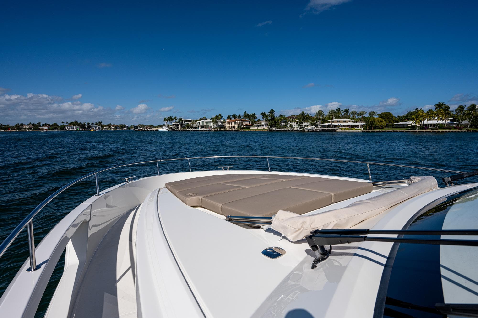 Greenline 45 Fly 2022 on calm waters with blue sky.