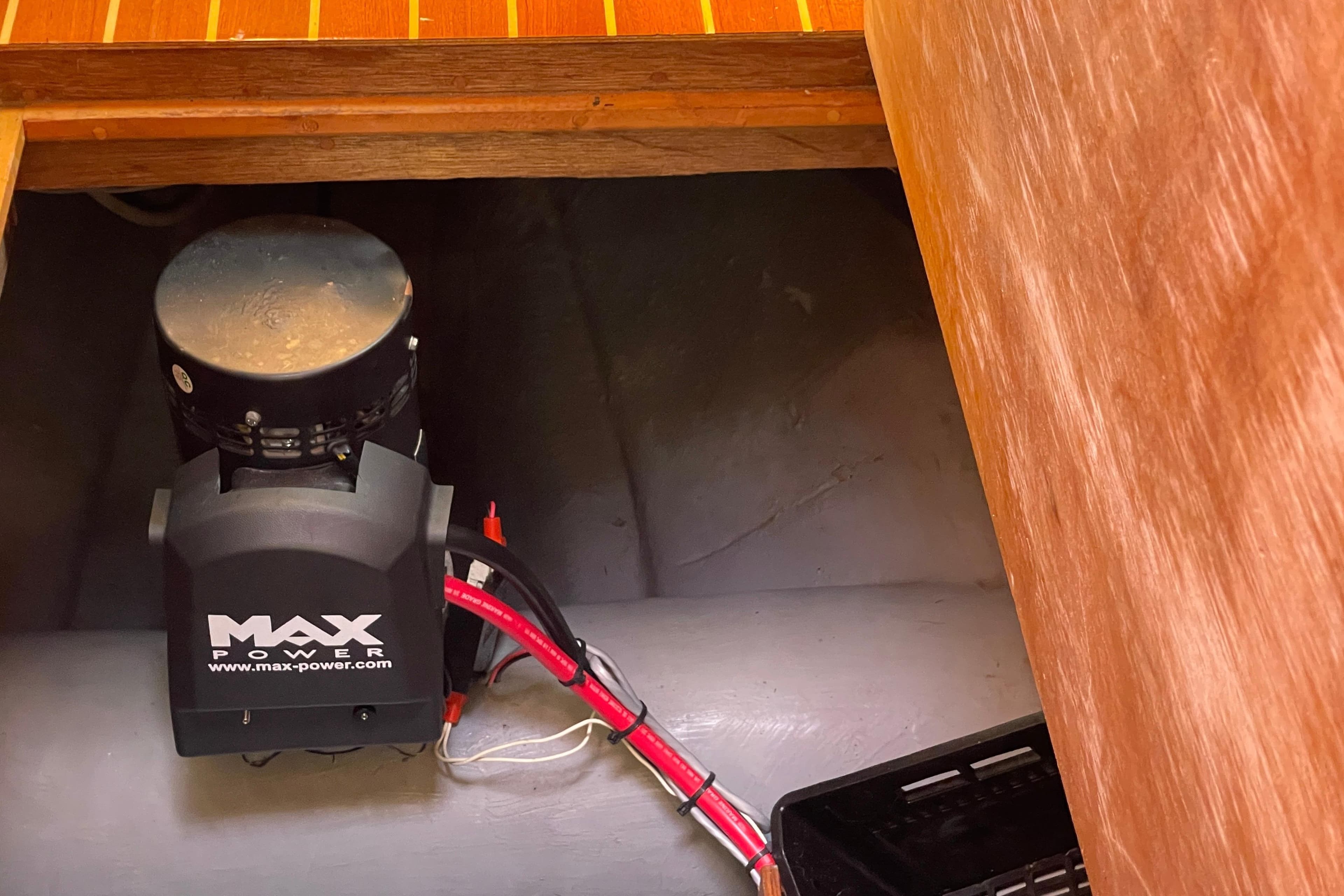 Max Power equipment in a 1979 Canoe Cove 53 boat interior compartment.