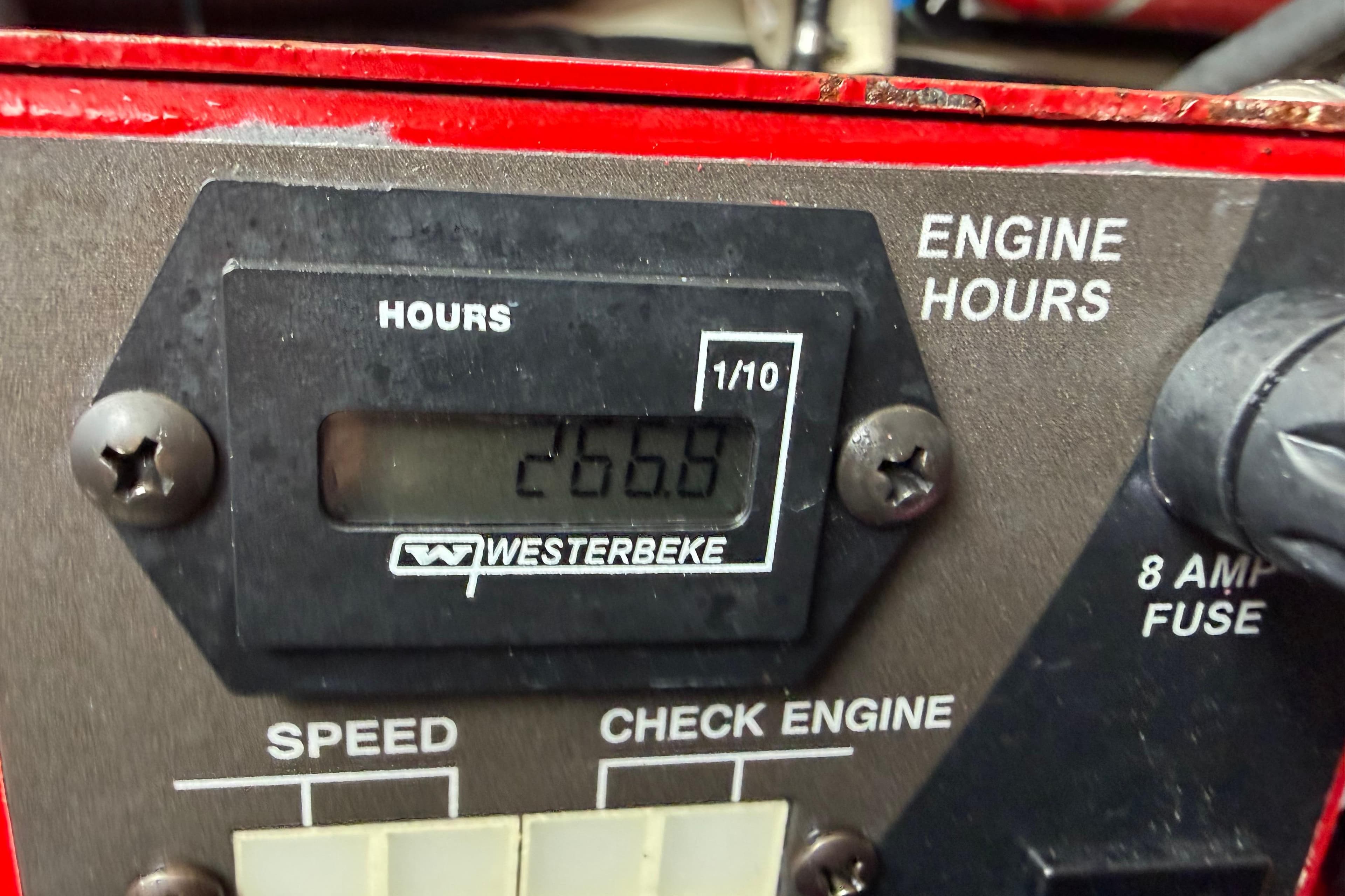 Westerbeke engine hour meter showing 266.9 hours on a 2021 Regal 36 XO.