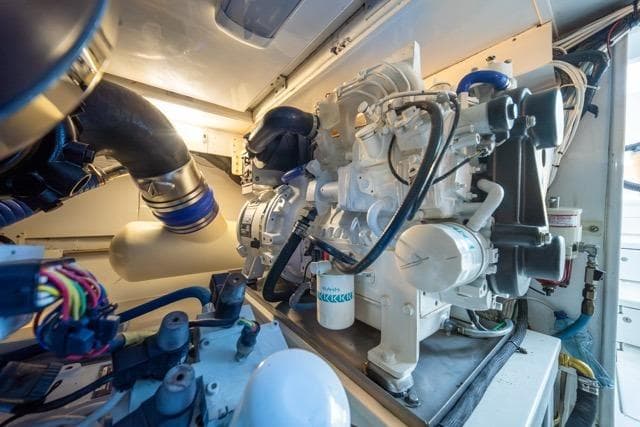 Engine room of a 1997 Garlington Convertible, showcasing detailed mechanical components.