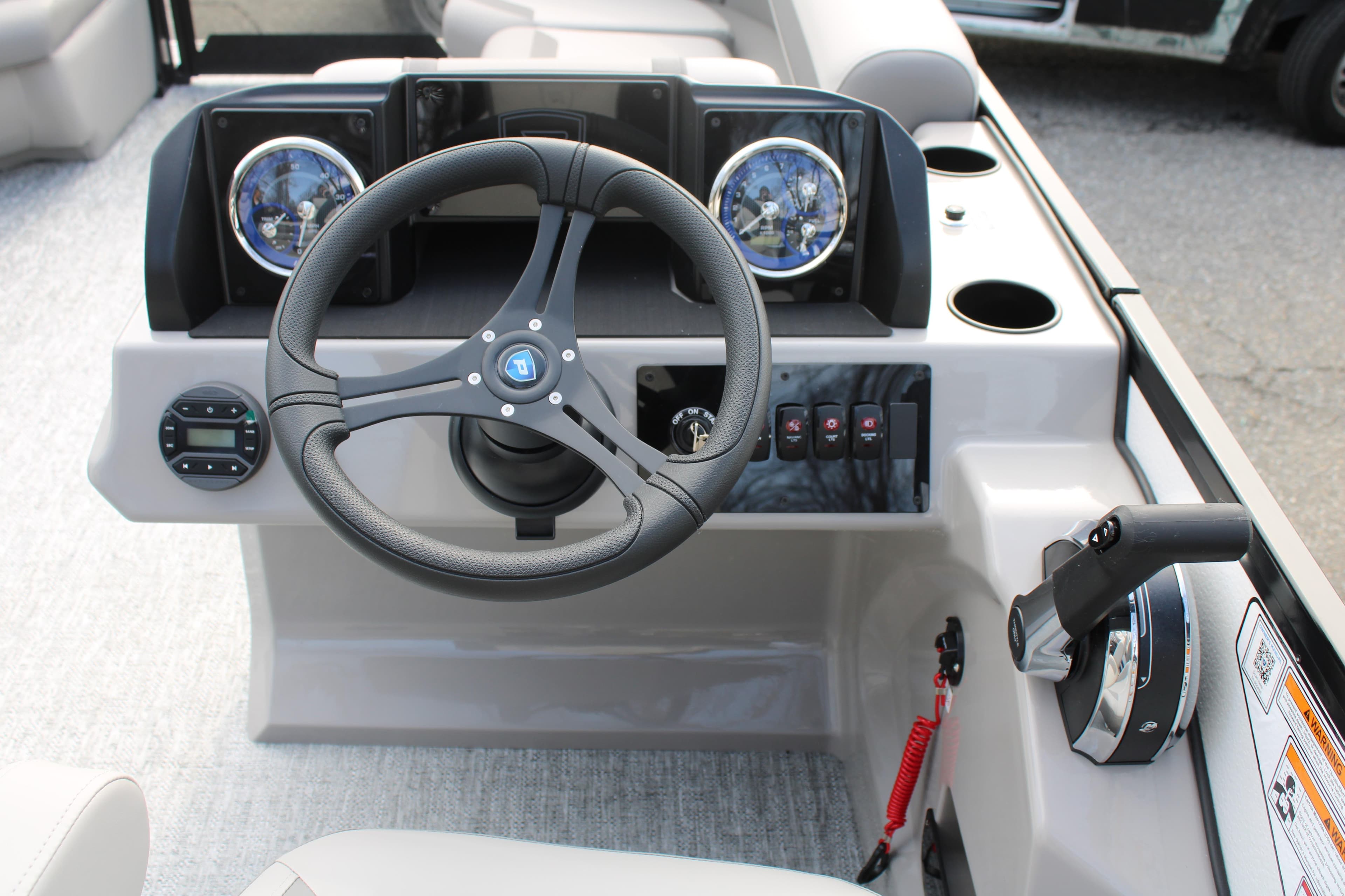 Steering console of 2026 Premier 220 Sunscape RL - CL boat with modern controls.