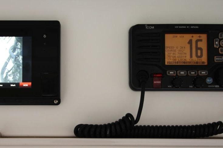 Control panel and radio equipment on a 1999 Ocean Yachts 60 Super Sport.