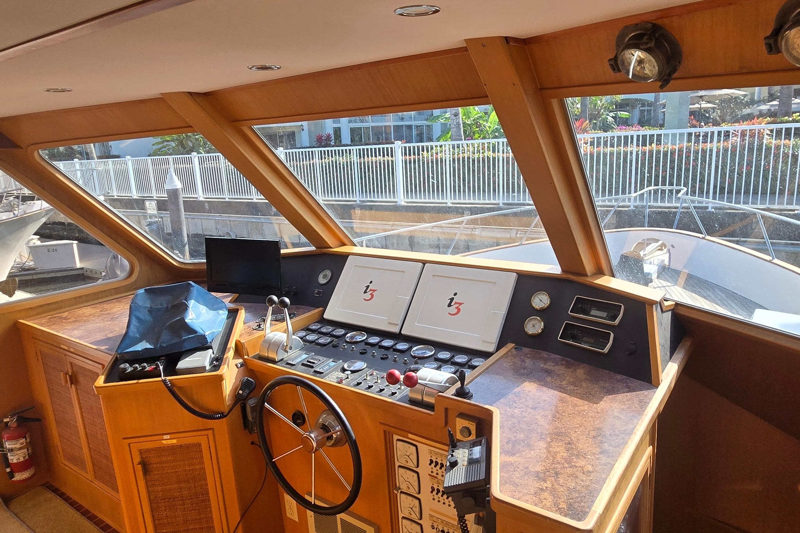 Interior view of a 1987 Southern Cross 53 yacht cockpit with navigation controls.