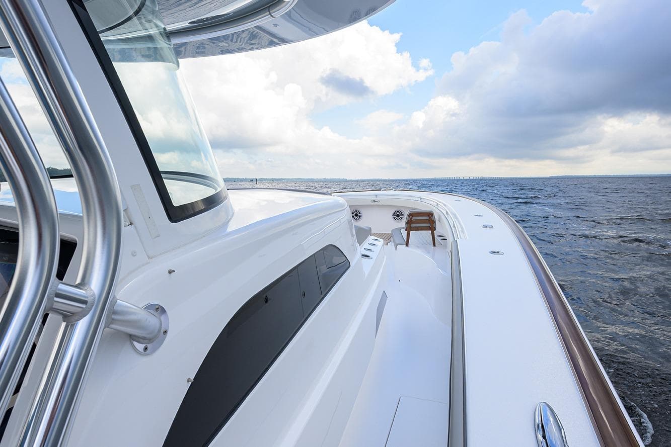 Valhalla V-46 yacht cruising on open sea, 2026 model, sleek design, clear skies.