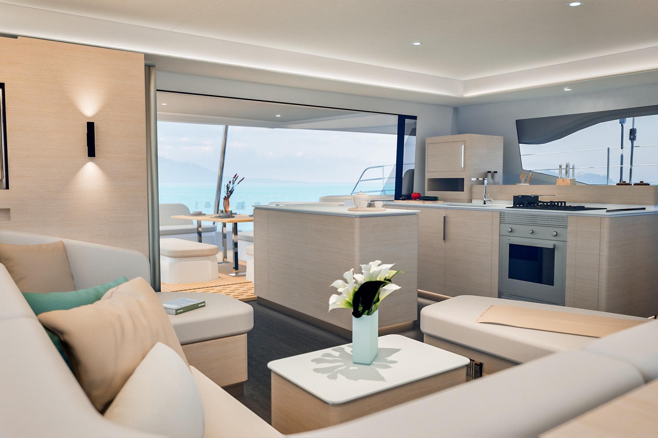 Luxurious interior of 2026 Fountaine Pajot FP 55 yacht with modern kitchen and seating area.