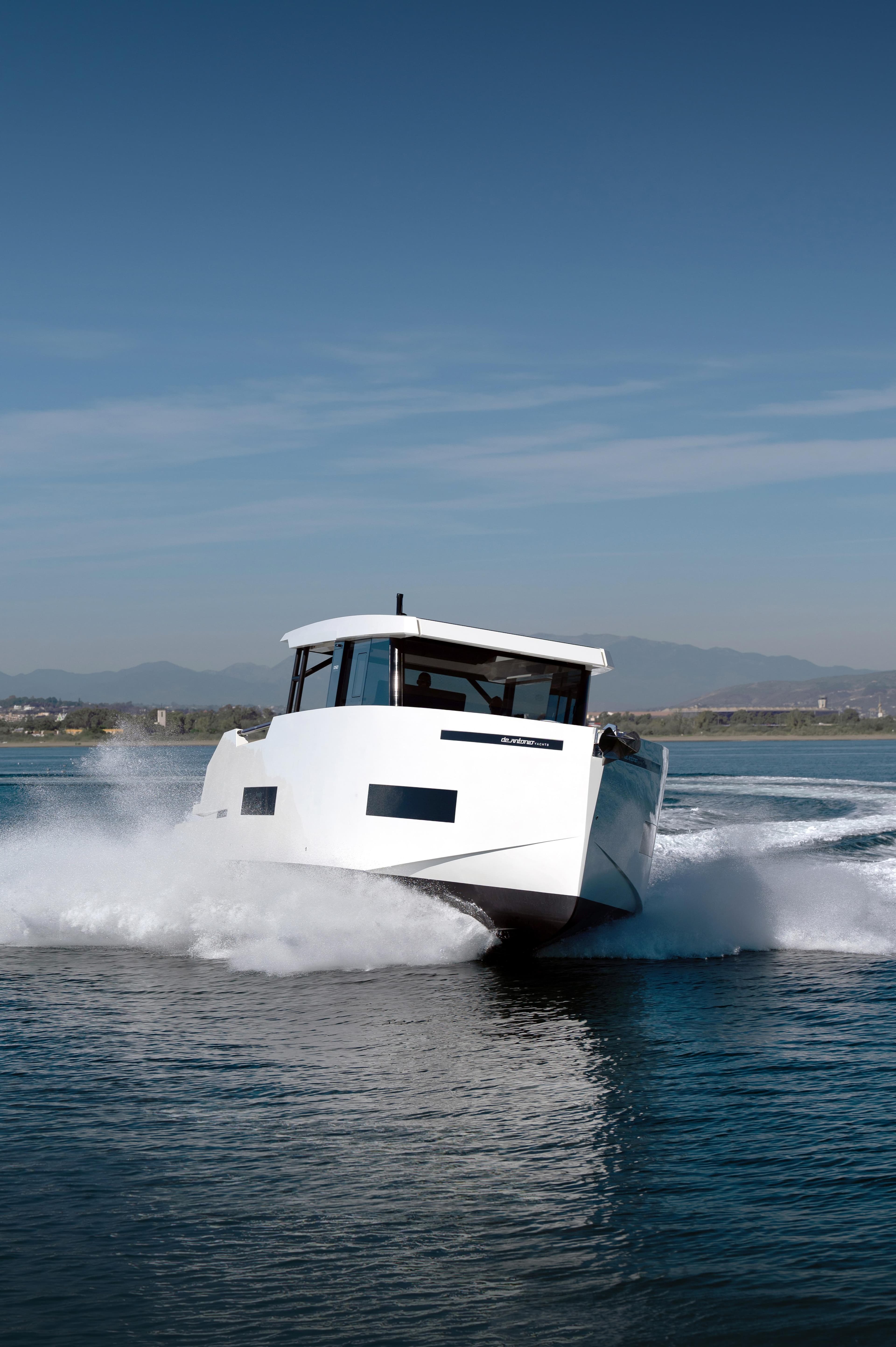 2025 De Antonio Yachts D50 Coupé cruising on open water.