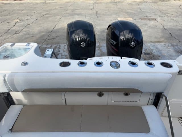 2016 Sailfish 275 DC boat with dual Mercury engines.