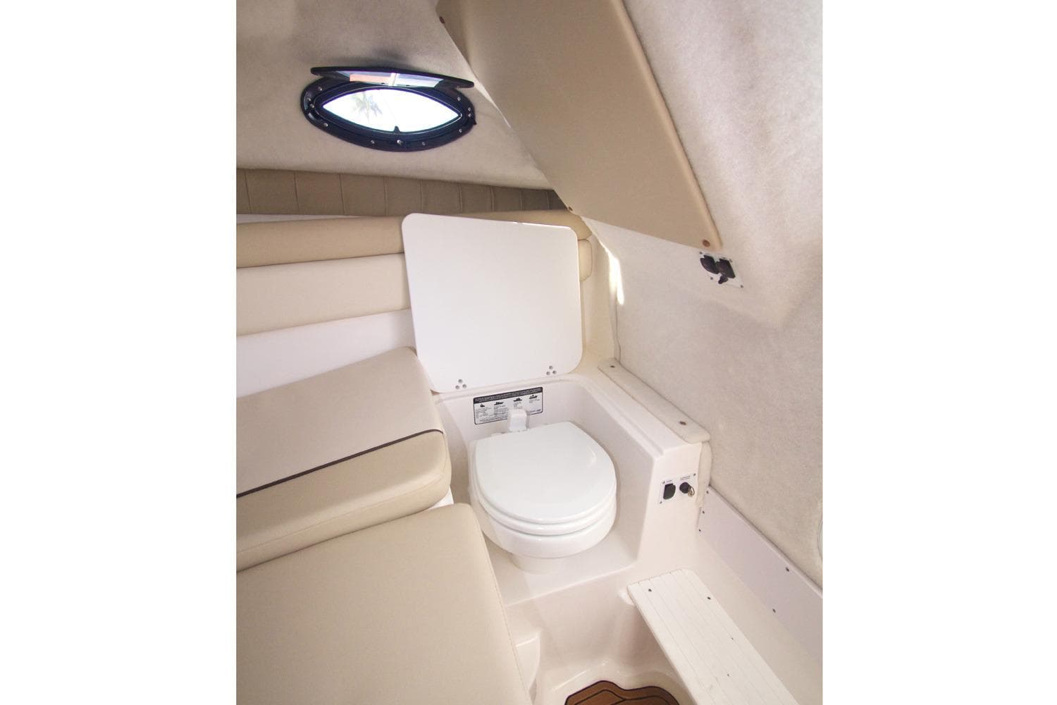Manufacturer Provided Image: 2017 Sea Fox 256 Voyager cabin with toilet and seating area.