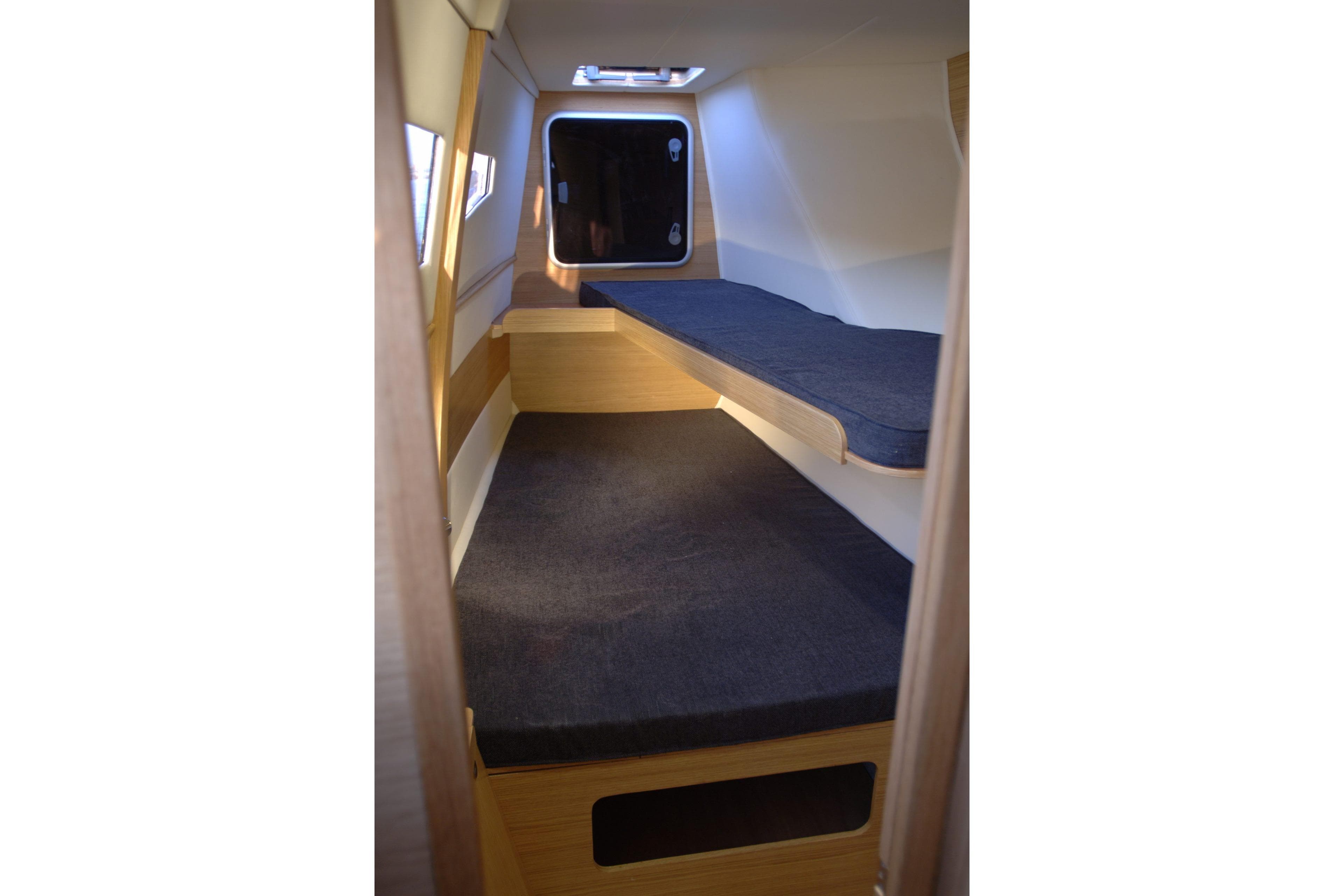 2026 C-Catamarans C-CAT 38 cabin interior with bunk beds and modern design.