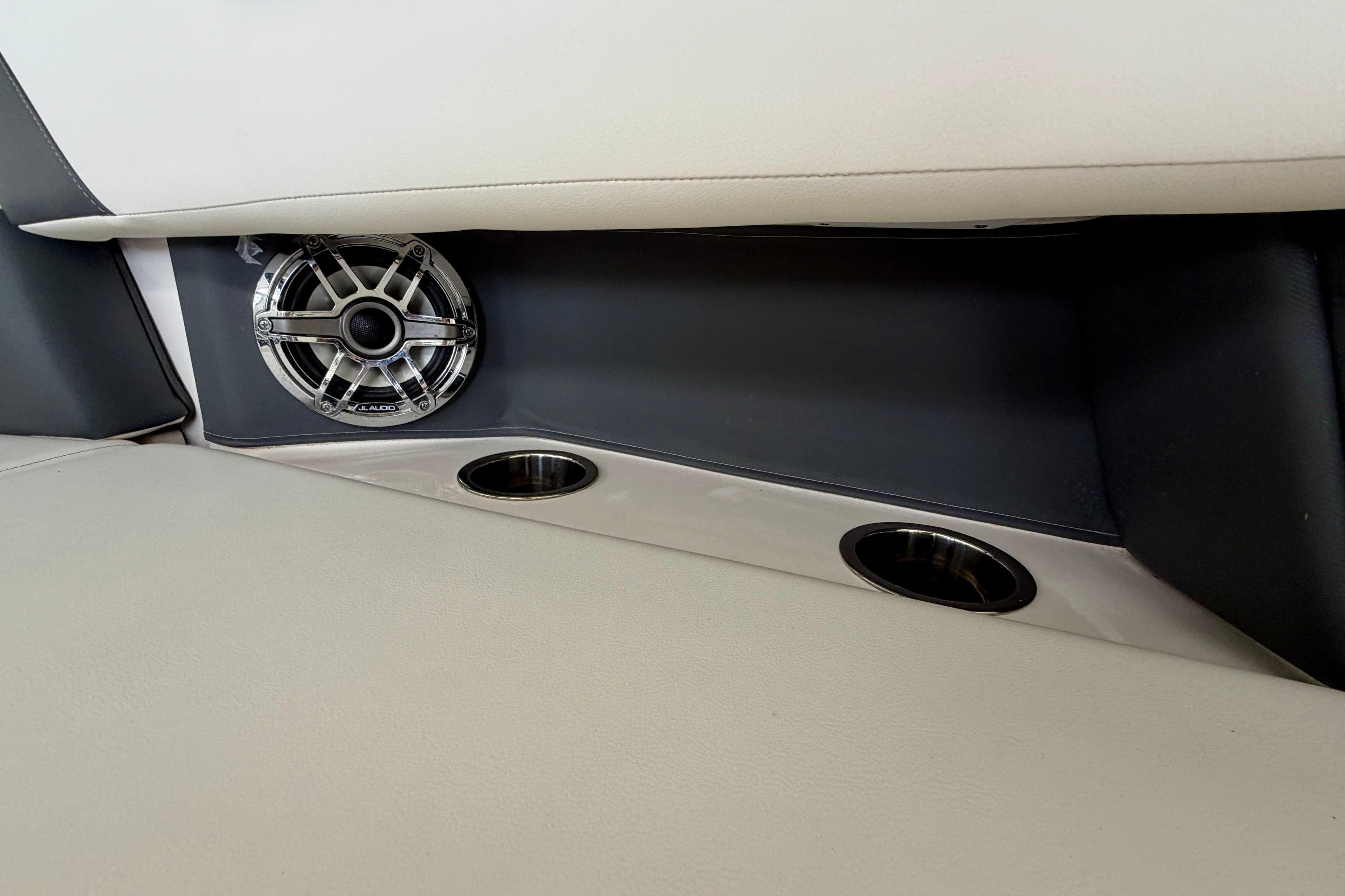2022 Chaparral 317 SSX interior with speaker and cup holders.