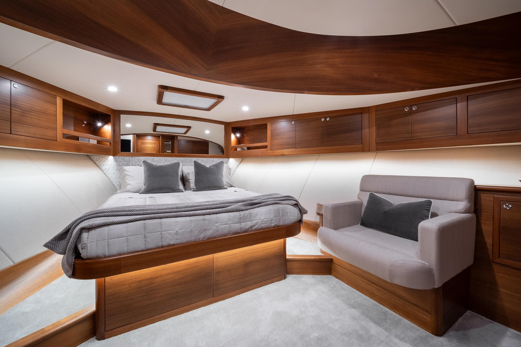 Luxurious 2026 Palm Beach Motor Yachts PB70 cabin with elegant wood finishes and modern design.