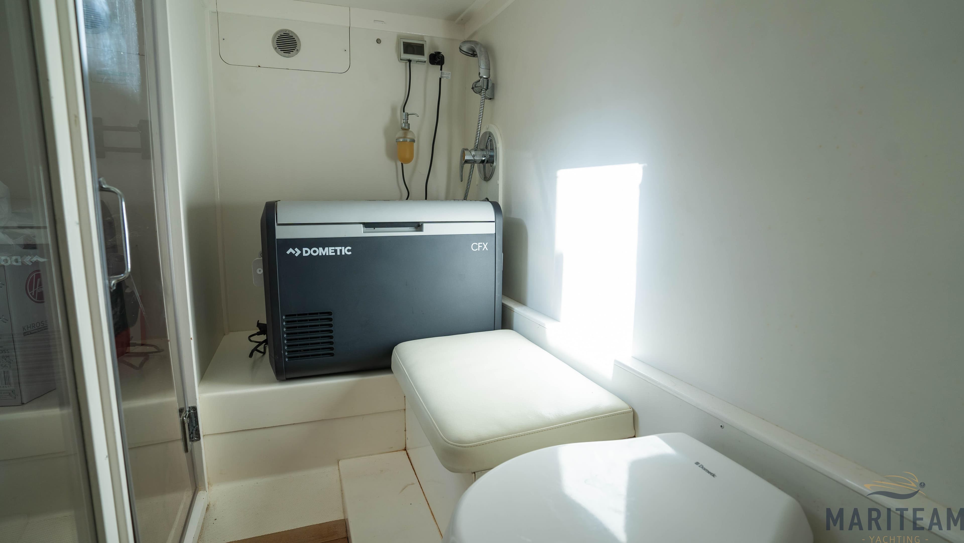 2011 Grand Banks 41 Heritage EU interior with Dometic appliance and seating area.