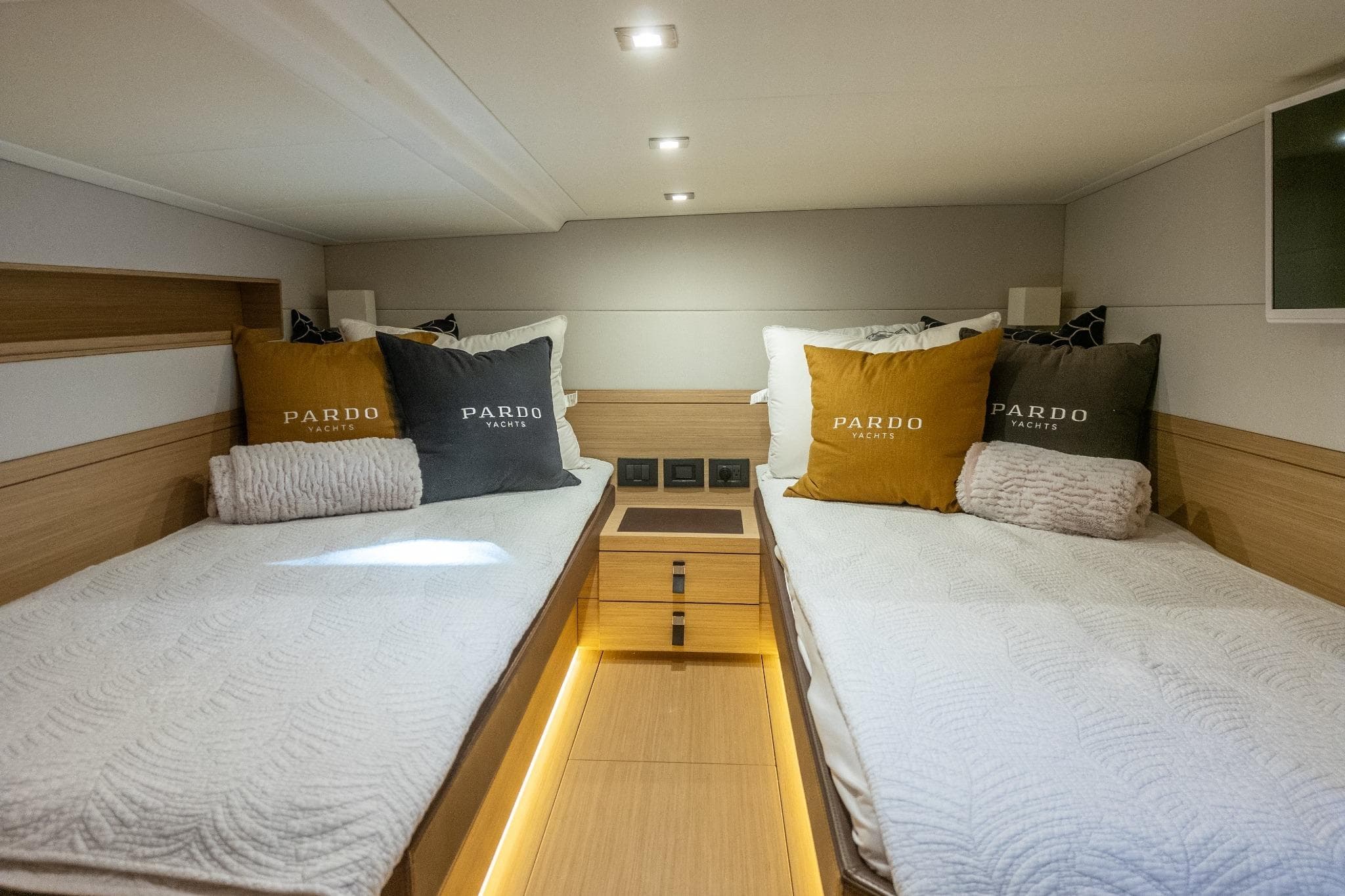 Luxurious 2019 Pardo Yachts P50 cabin with twin beds and elegant decor.