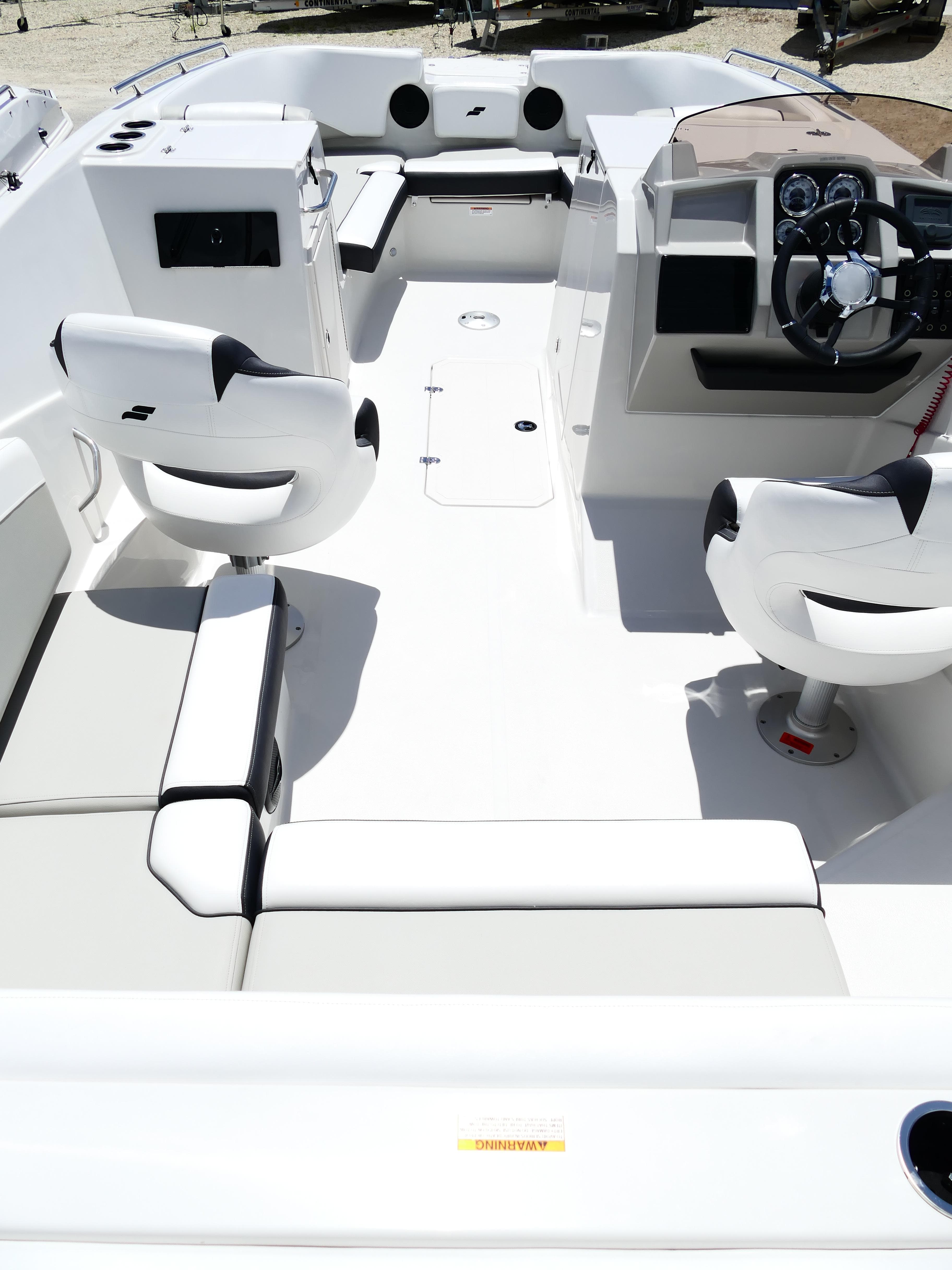 2026 Starcraft SVX 231 OB DH boat interior with modern seating and steering console.
