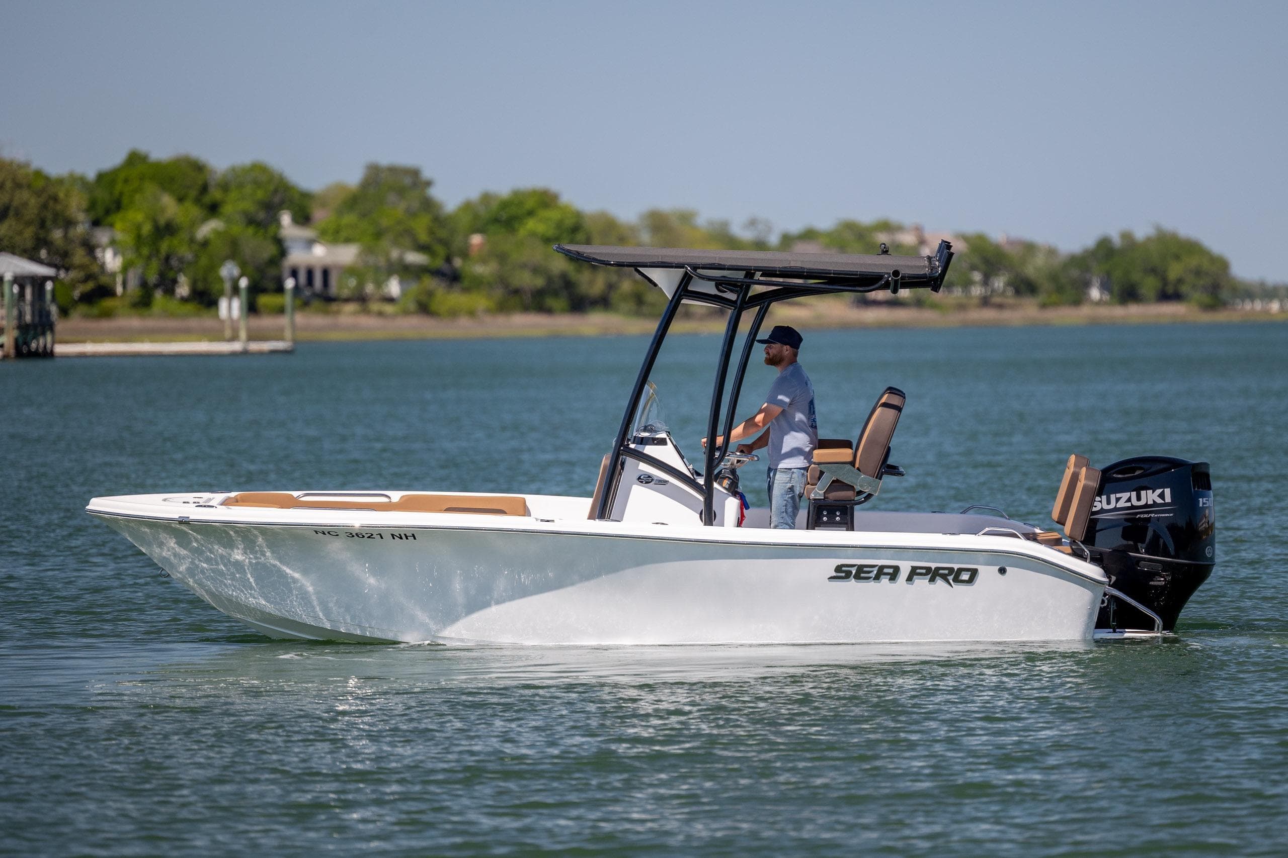 2025 Sea Pro 202 Center Console boat on water, featuring Suzuki outboard motor.