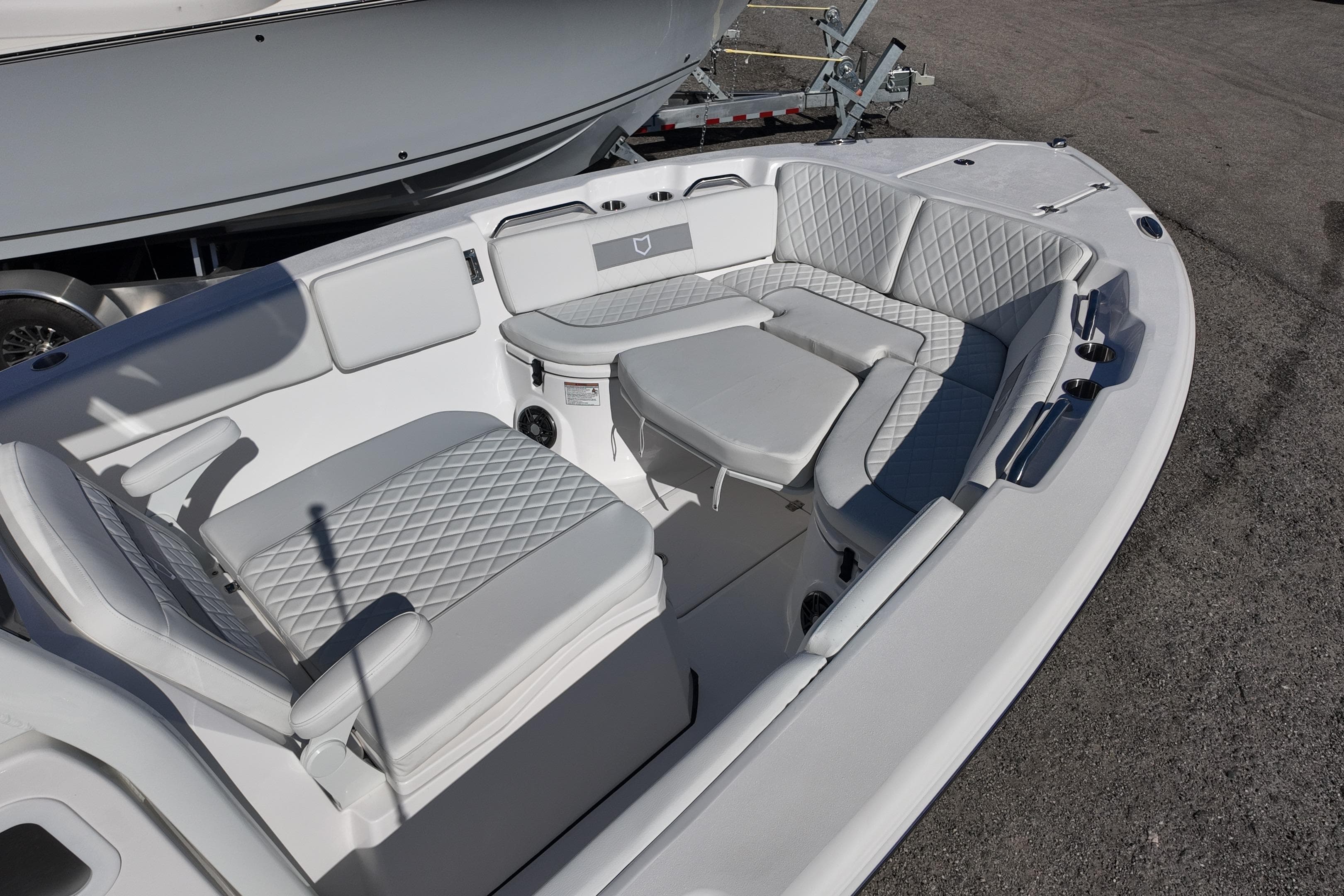 2026 Sea Fox 268 Commander boat interior with cushioned seating and modern design.