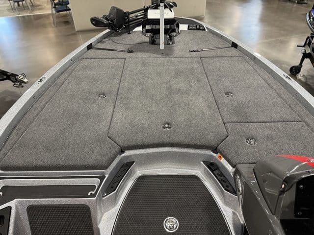 2026 Ikon Boats LXE20 deck, spacious and carpeted, ideal for fishing and leisure activities.