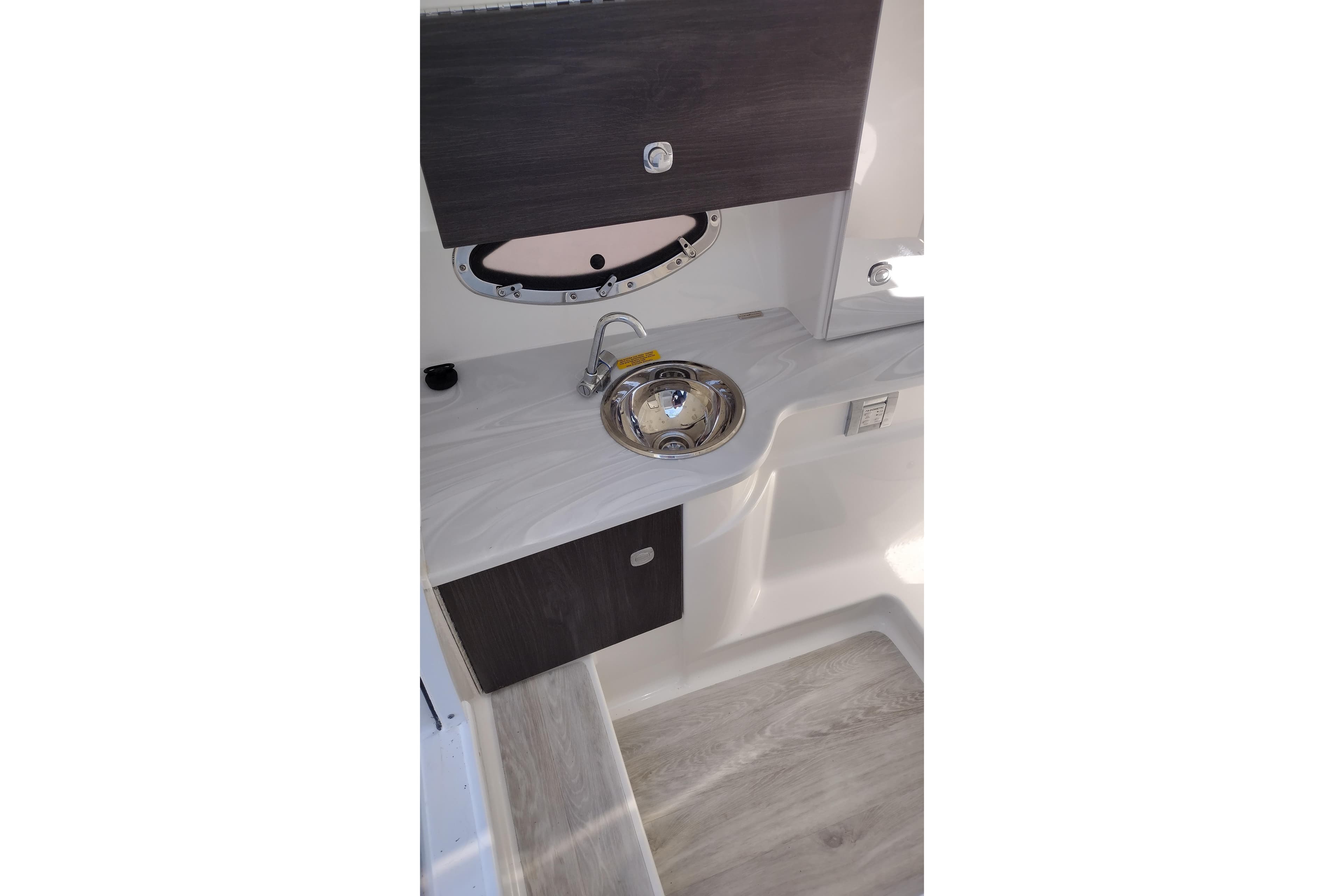 2022 Formula 310 Bowrider interior sink and countertop detail.
