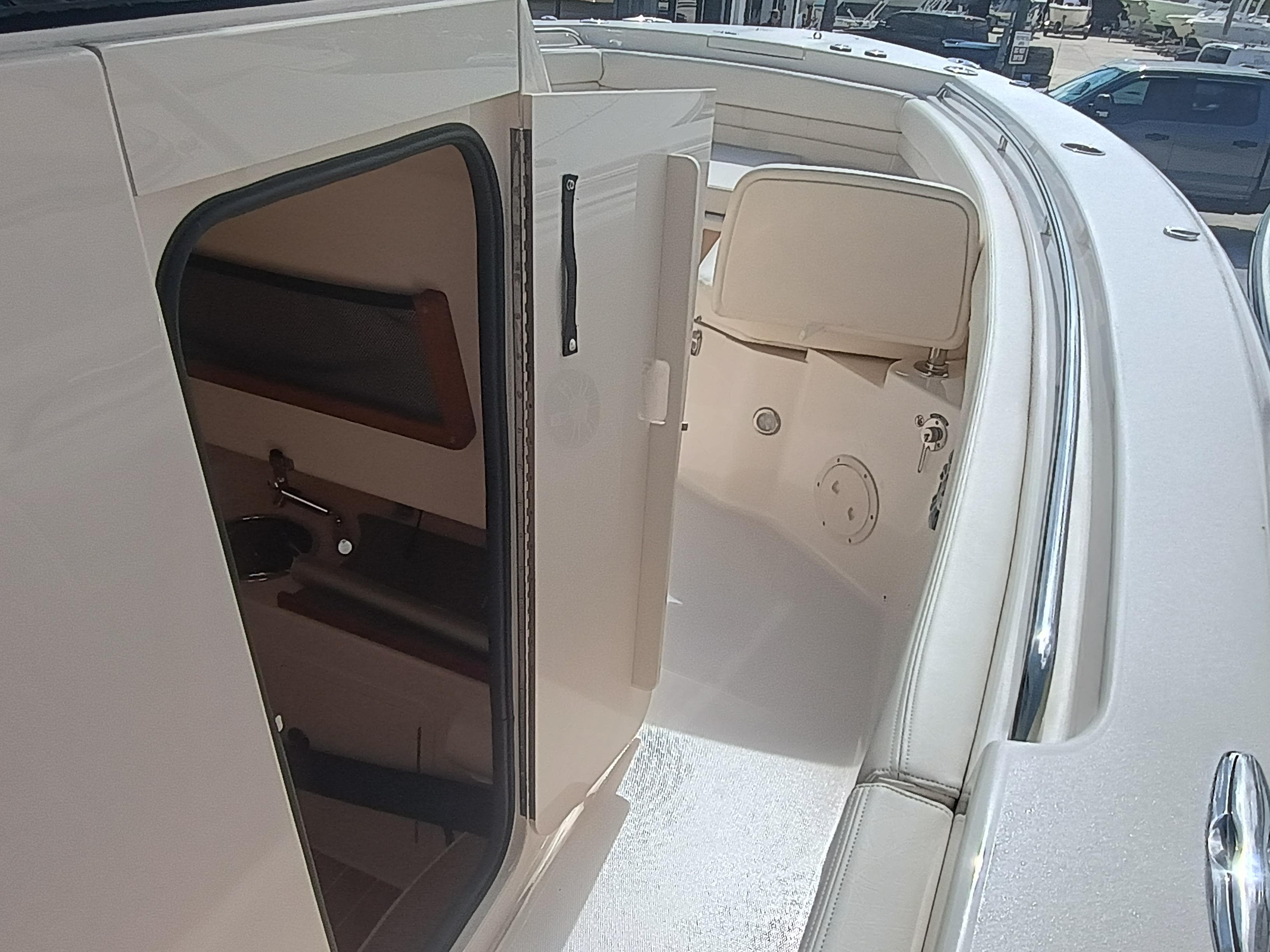 2025 Grady-White Canyon 306 boat interior with open cabin door.