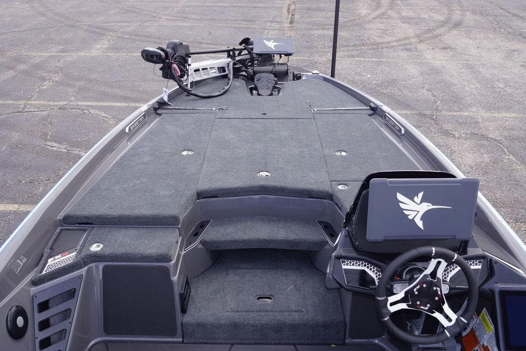 2026 Skeeter FXR20 PRO boat interior with steering wheel and control panel.