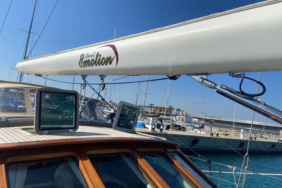 Sailboat "Sweet Emotion" by Holland Jachtbouw, Classic Hoek 82, 2002, docked in marina.