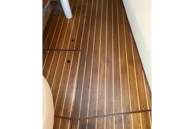 Teak flooring on 1995 Hunter Legend 40.5 sailboat interior.