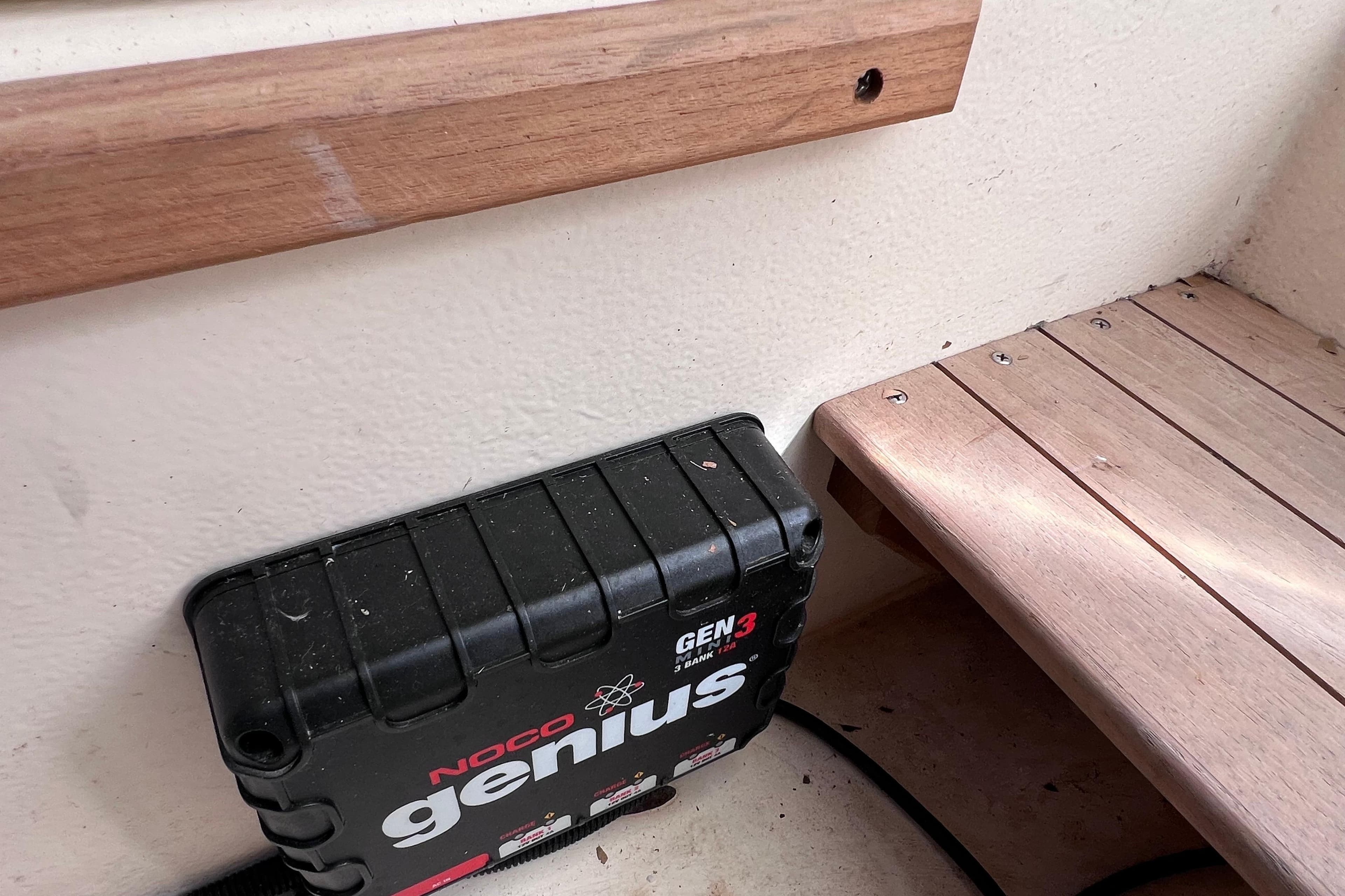 NOCO Genius GEN3 charger on 2005 Parker 2510 Walkaround boat with wooden trim.