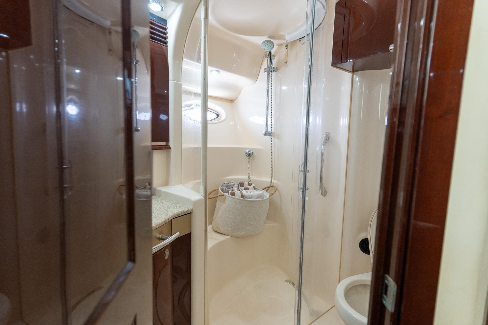Luxurious bathroom in 2008 Sea Ray 520 Sedan Bridge yacht, featuring modern shower and elegant design.