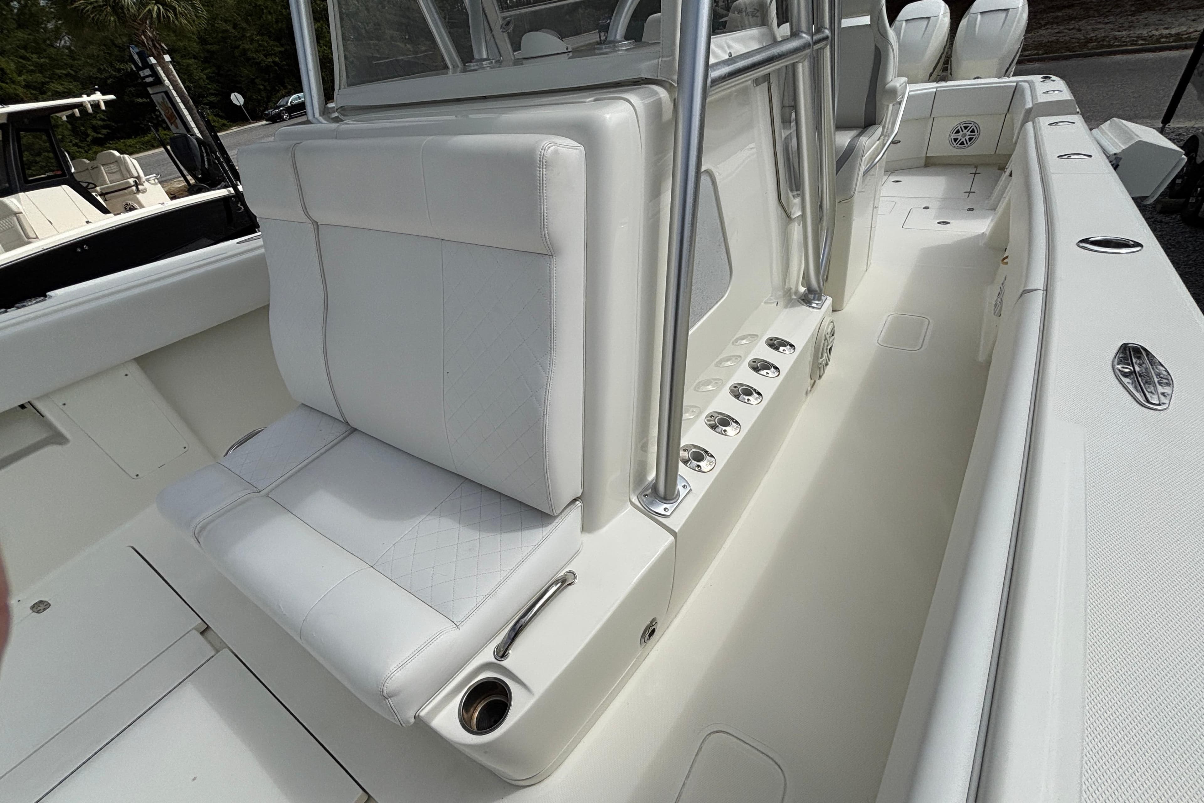2018 SeaVee 390Z boat interior with white seating and stainless steel accents.