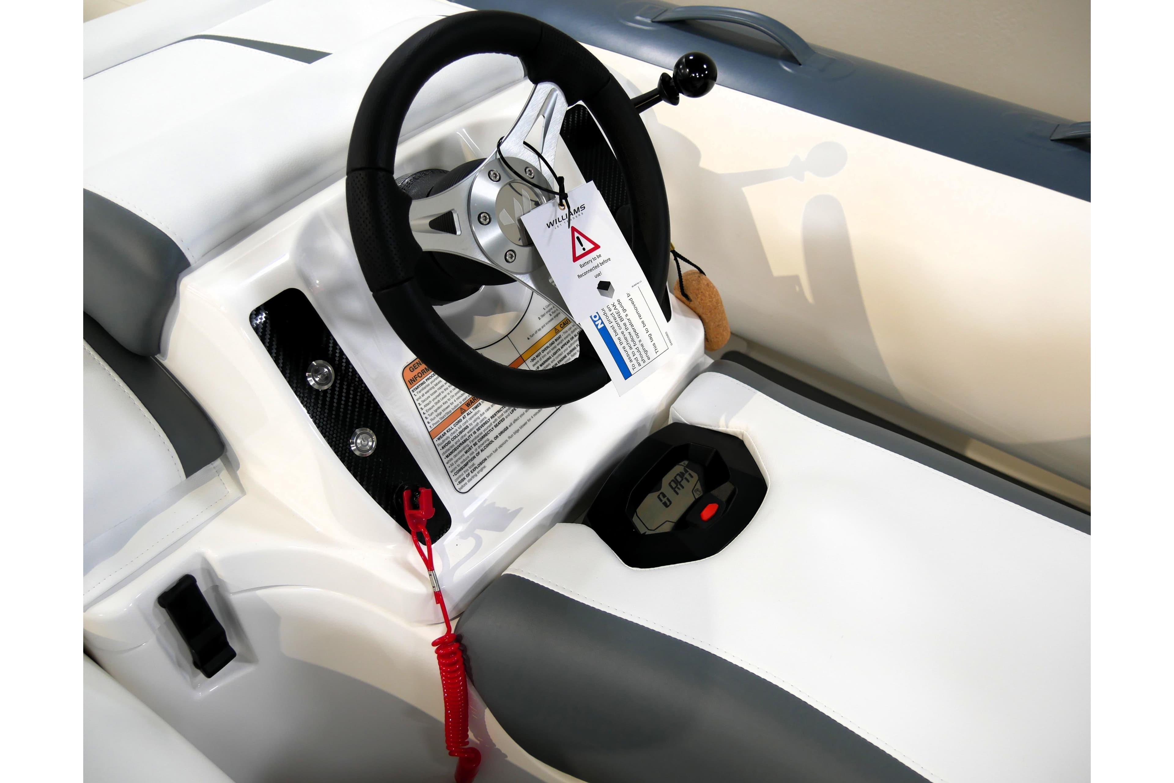 2026 Williams Jet Tenders Minijet 280 dashboard with steering wheel and control panel.