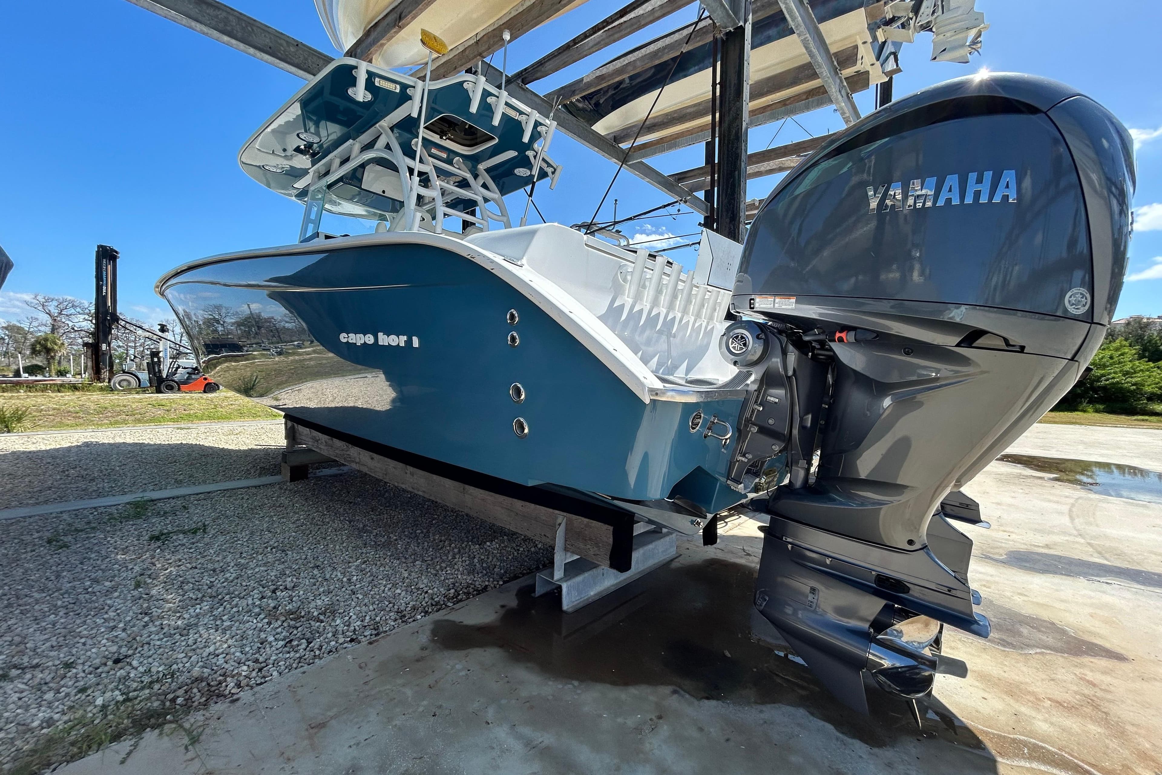 2022 Cape Horn 36 boat with Yamaha engine on a lift, side view.