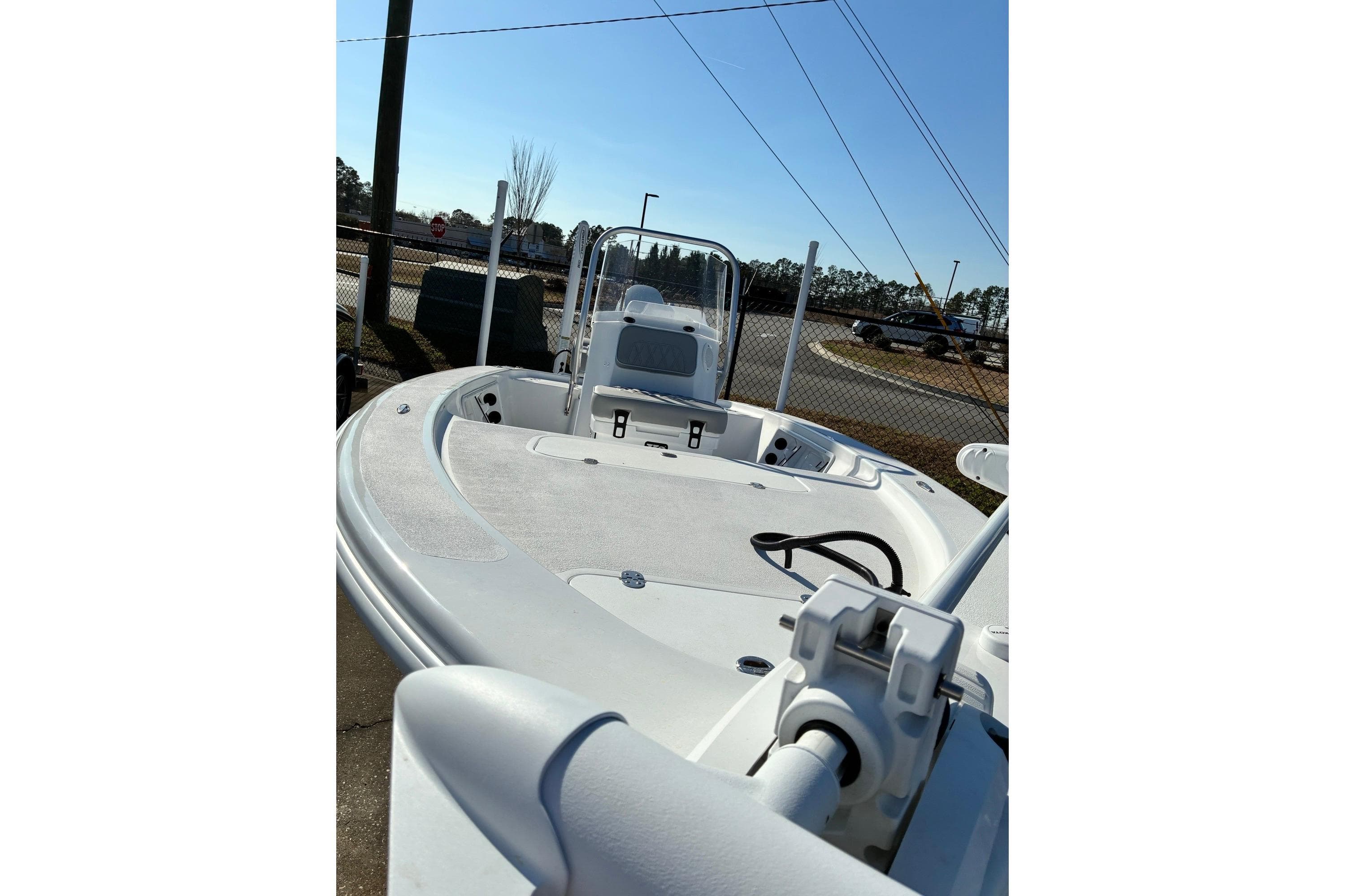 2026 ALK2 Powerboats 17HS model, sleek design, docked outdoors under clear sky.