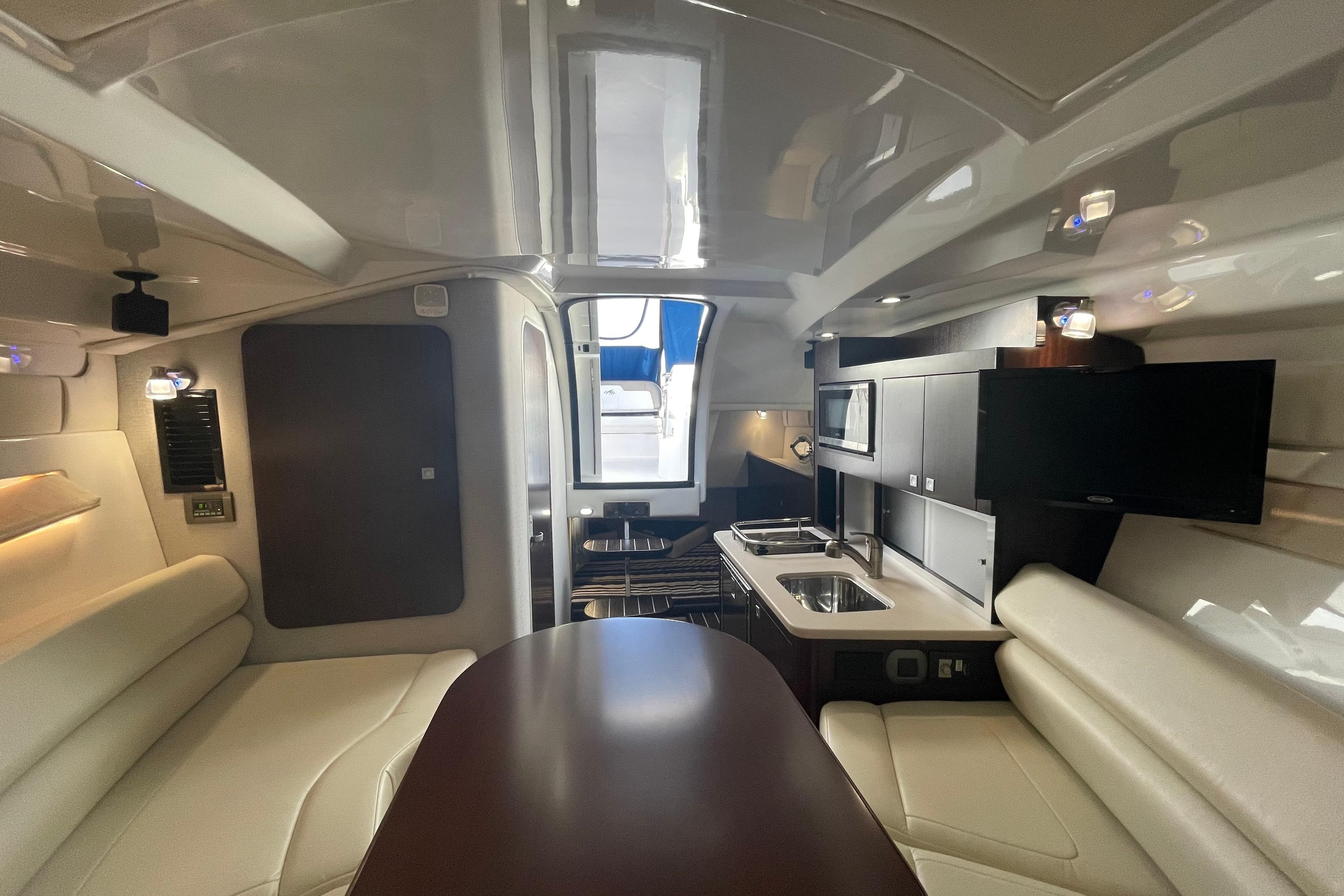 Luxurious interior of a 2019 Monterey 295 Sport Yacht with modern amenities.