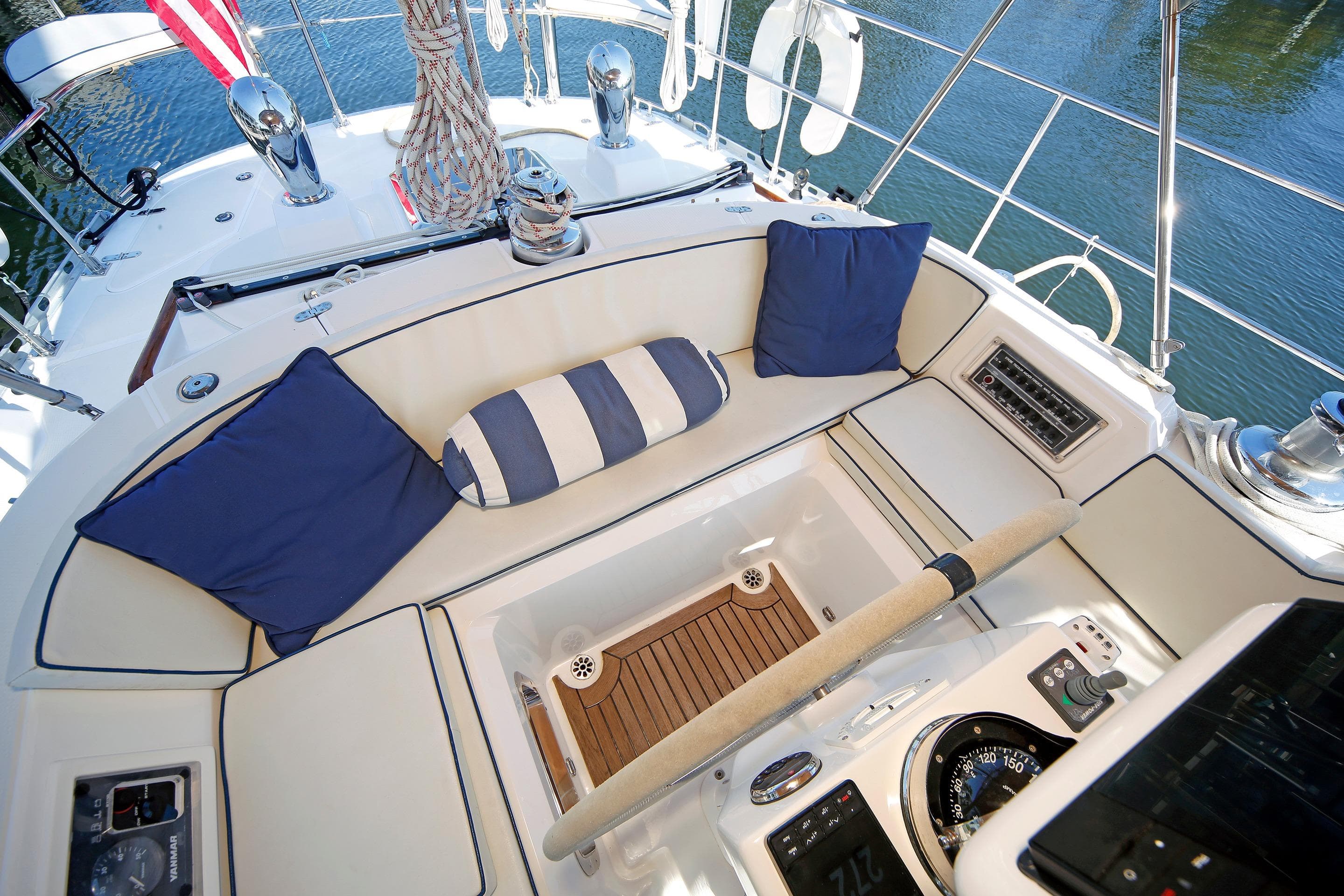 Luxurious 2012 Hylas 49CC yacht cockpit with plush seating and nautical decor.