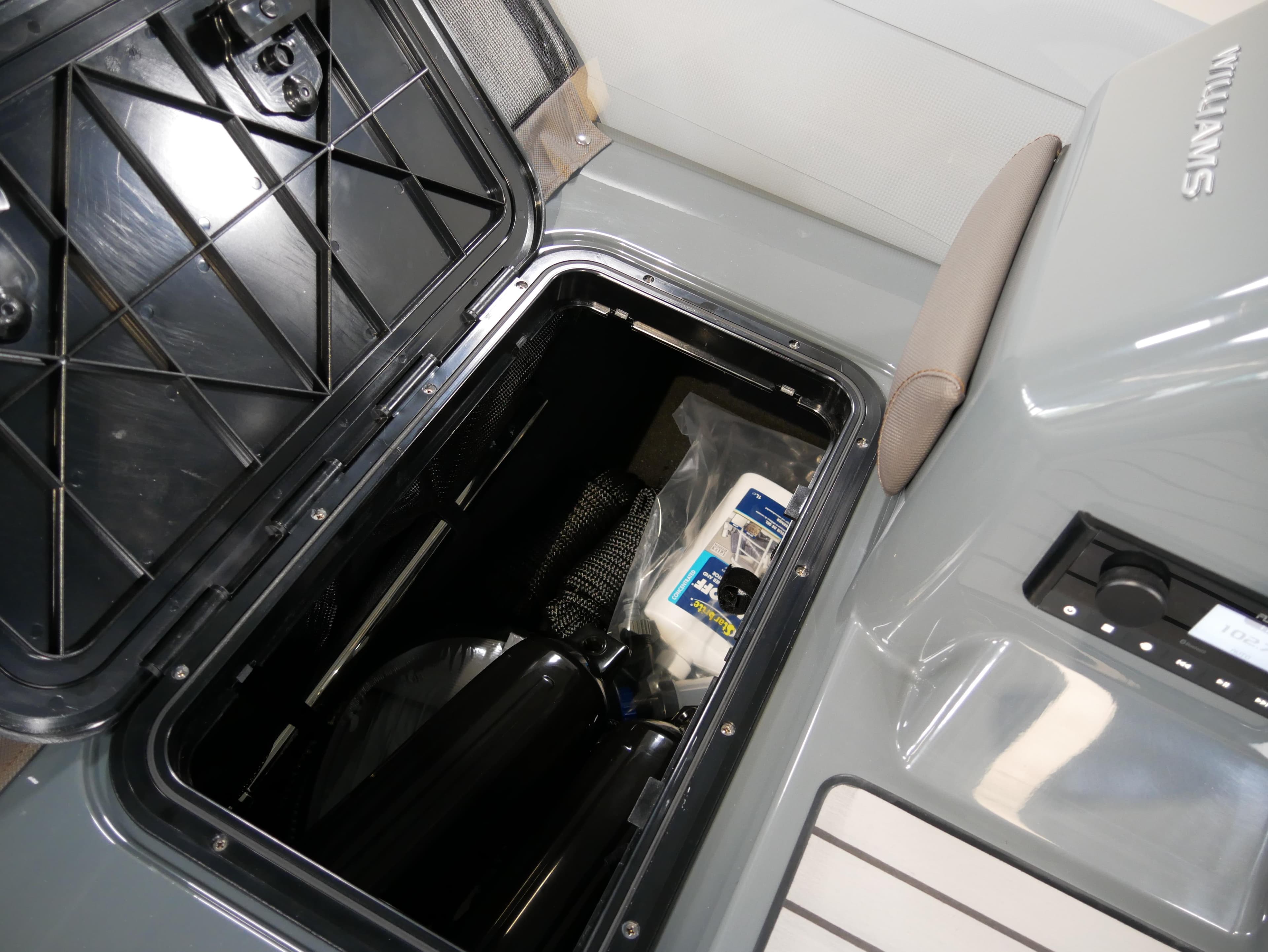 Storage compartment of 2025 Williams Jet Tenders SportJet 435, showcasing interior details.