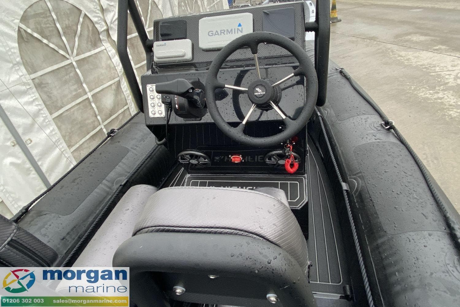 2023 Highfield Patrol 500 boat interior with Garmin navigation system, displayed at Morgan Marine.