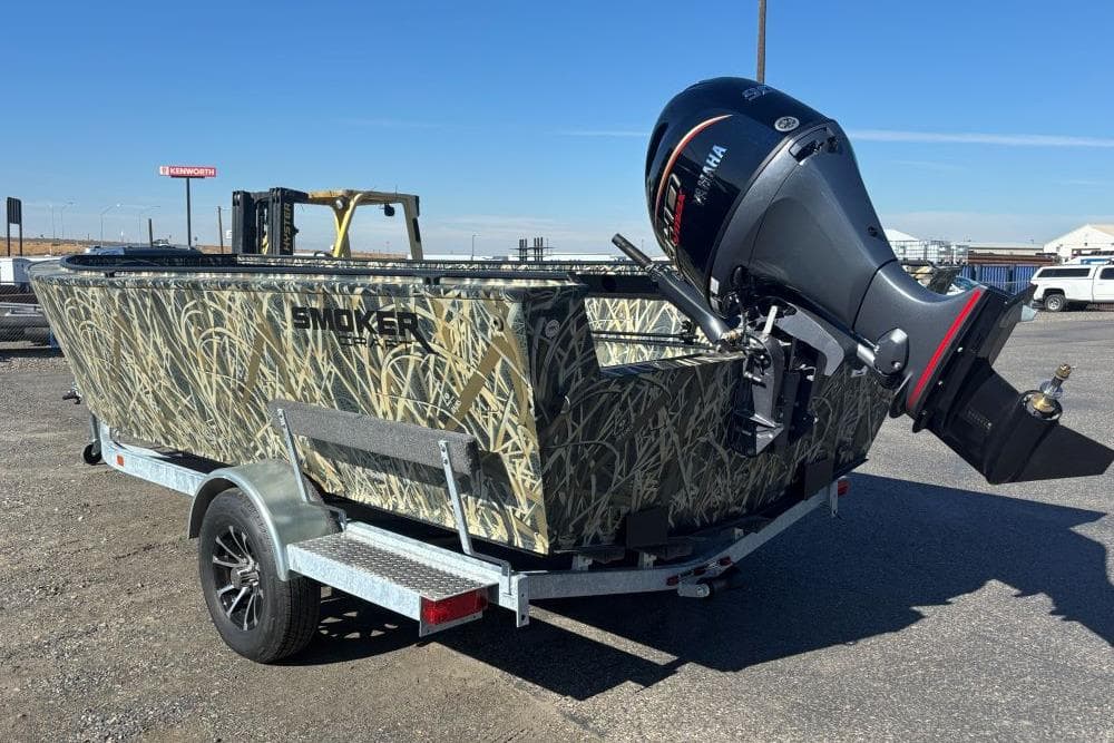 2026 Smoker Craft Pro Sportsman 1872 T boat with camouflage design and Yamaha outboard motor.