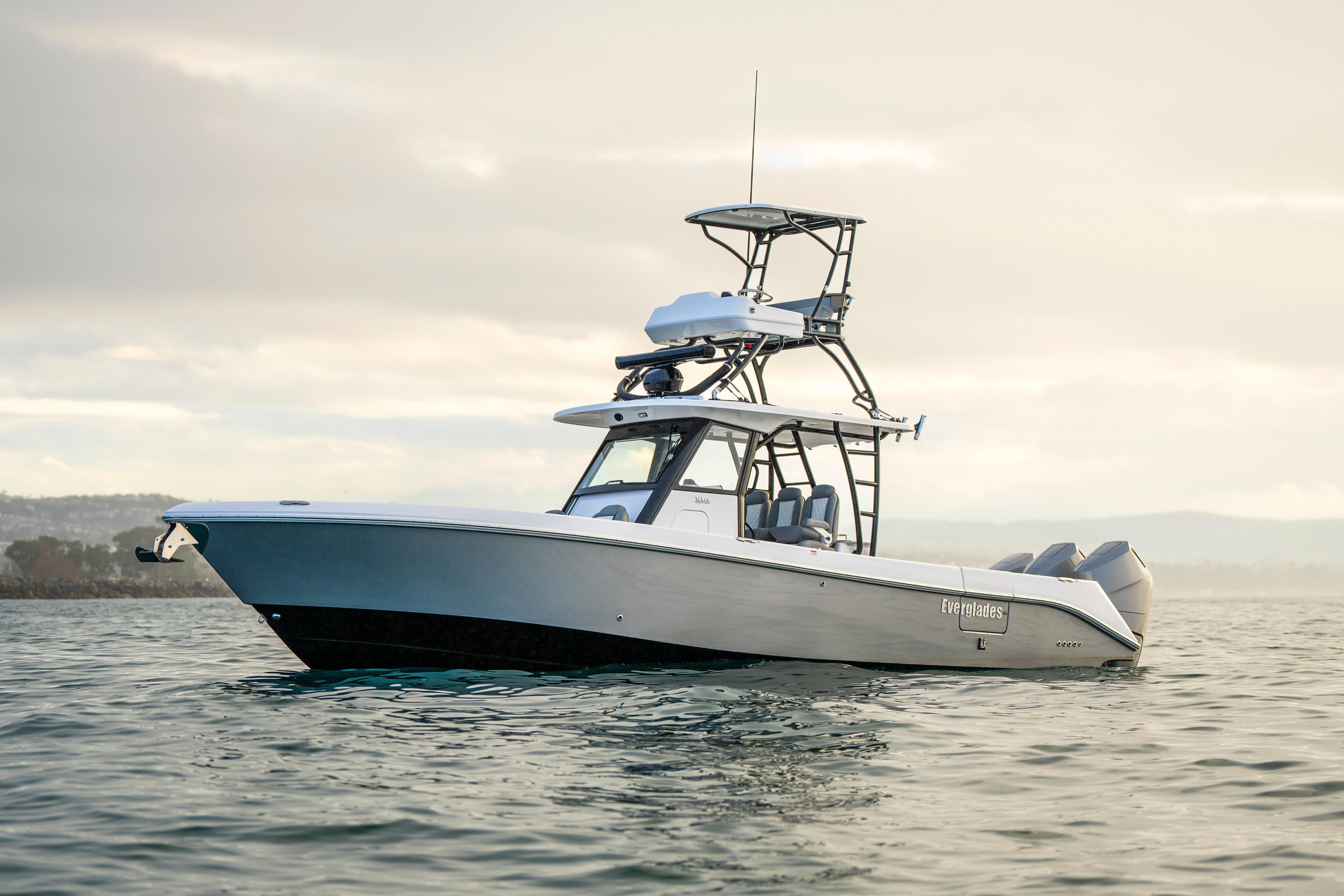 2024 Everglades 365 Center Console boat on calm water, showcasing sleek design and advanced features.