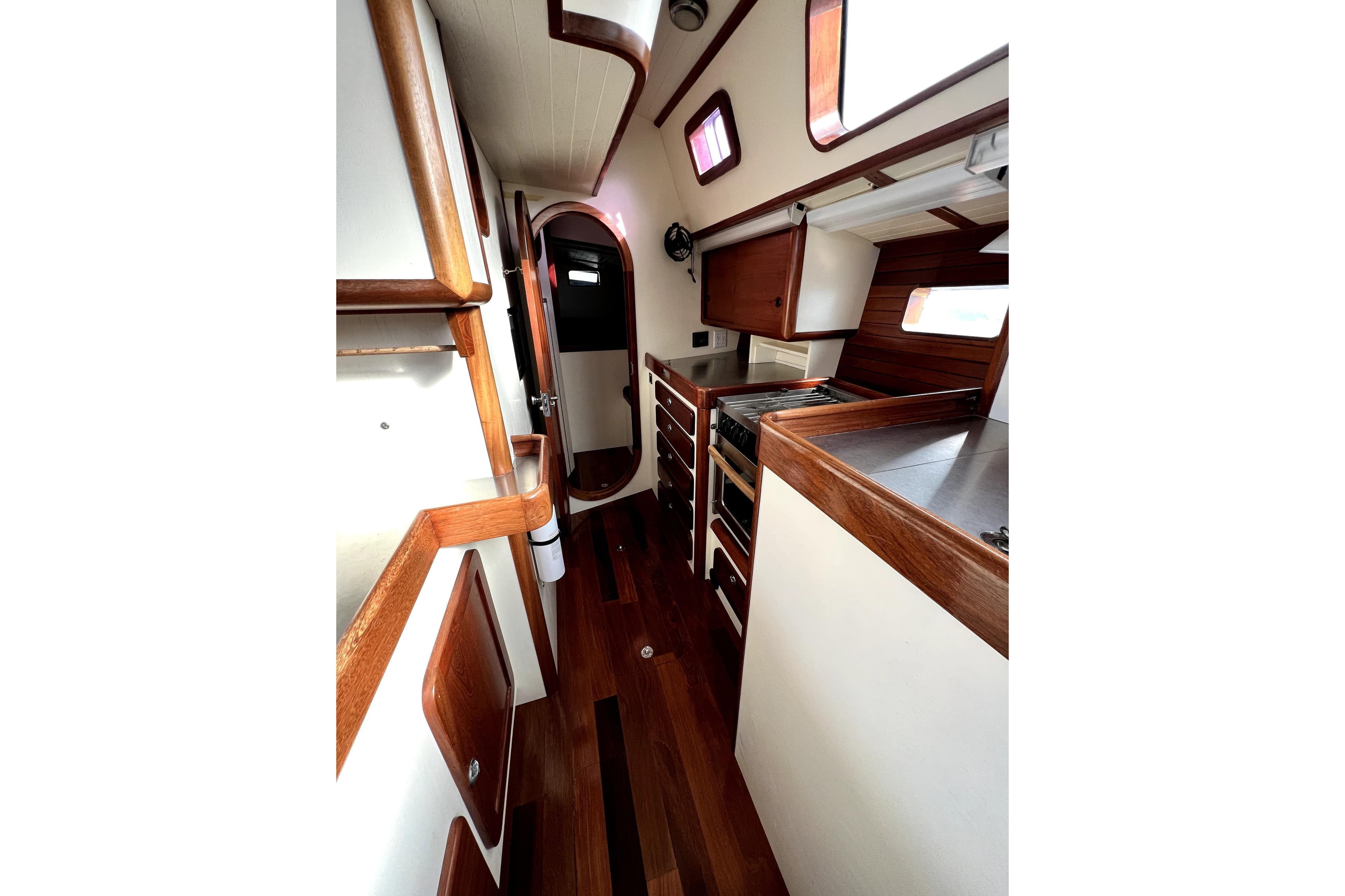 Interior of 2014 Custom Aluminum Expedition yacht with wood accents and modern kitchen.