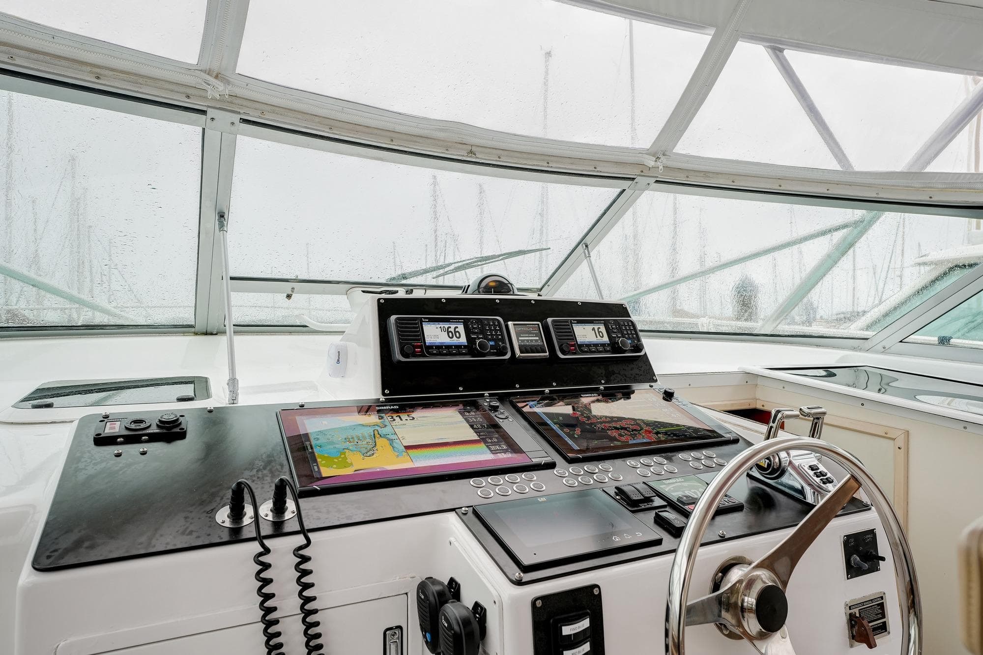 Cockpit of 1992 Viking 43 Open yacht with navigation equipment and steering wheel.