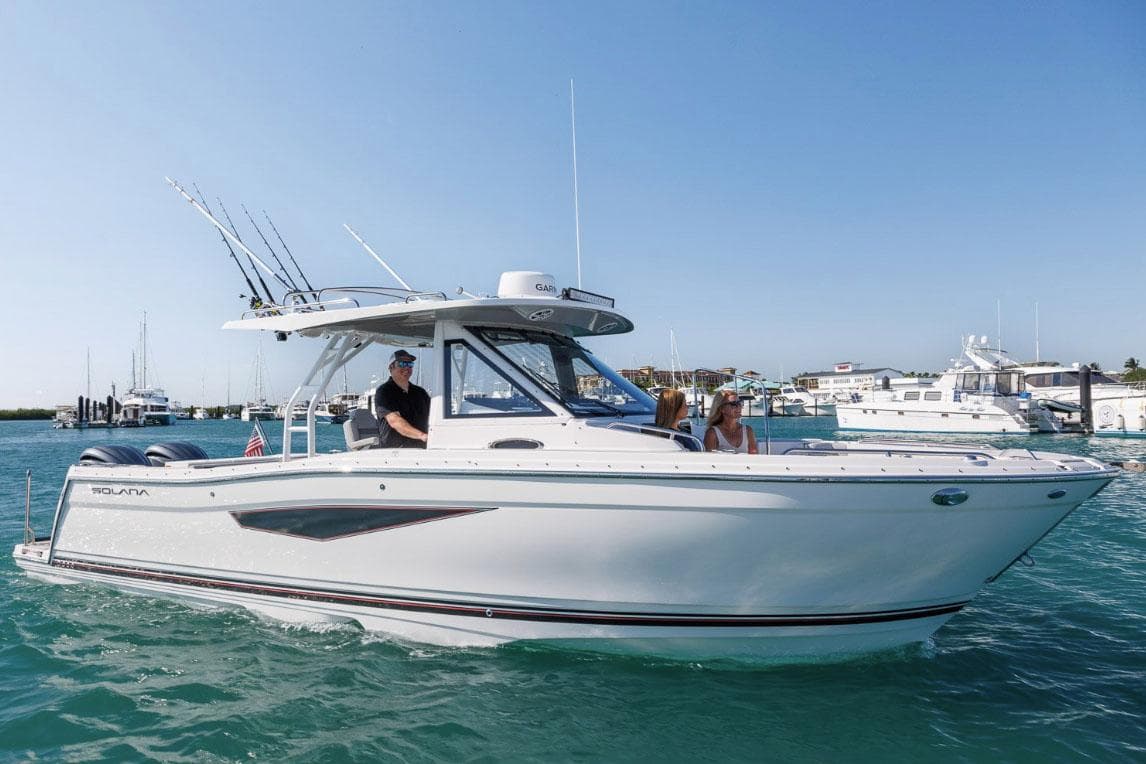 Manufacturer Provided Image: 2025 Solara S-310 CW boat cruising on clear blue water.