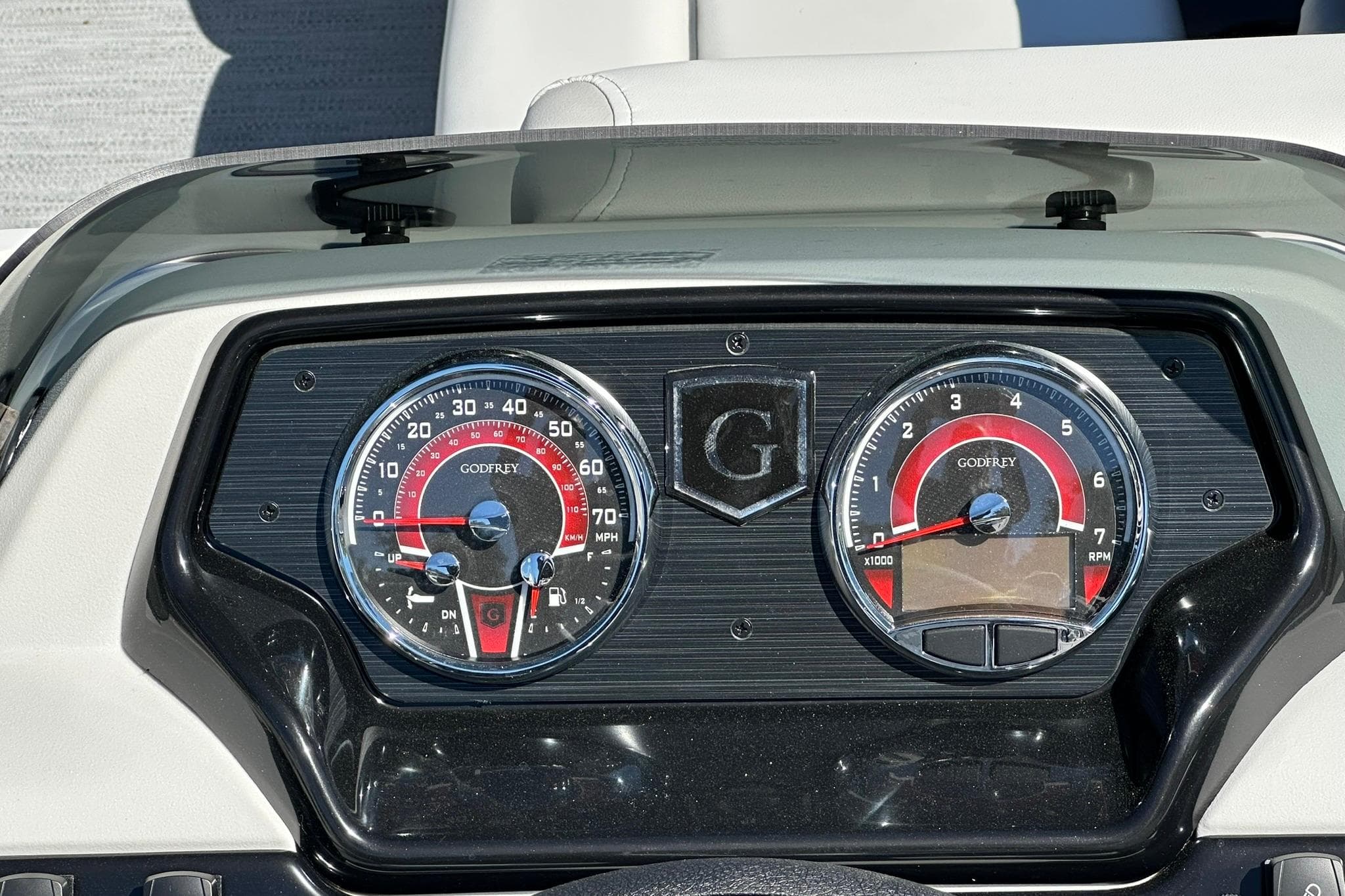 Dashboard of a 2026 Sweetwater SW2086CPSE boat with Godfrey gauges.