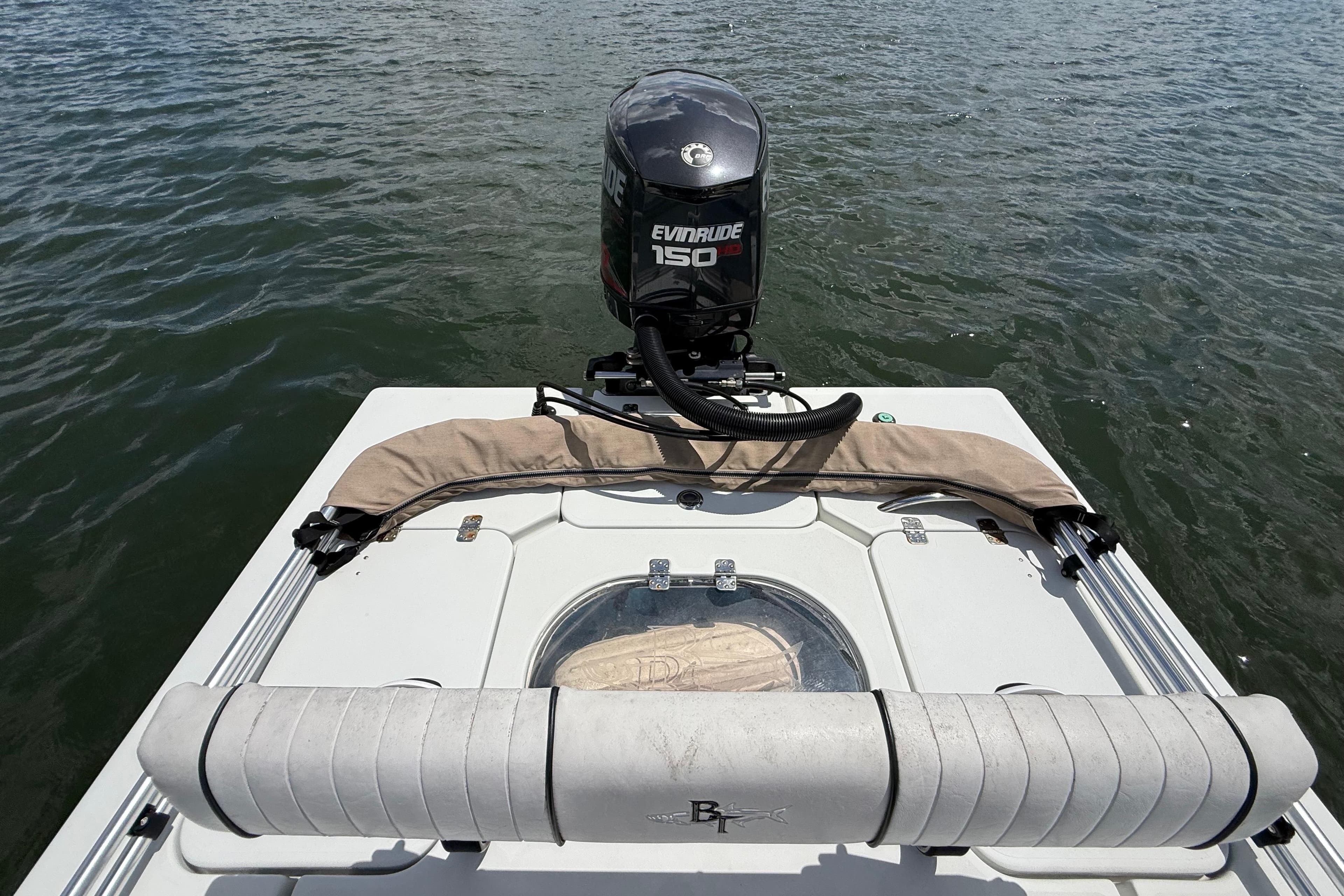 2017 Beavertail Skiffs Lightning with Evinrude 150 engine on water.