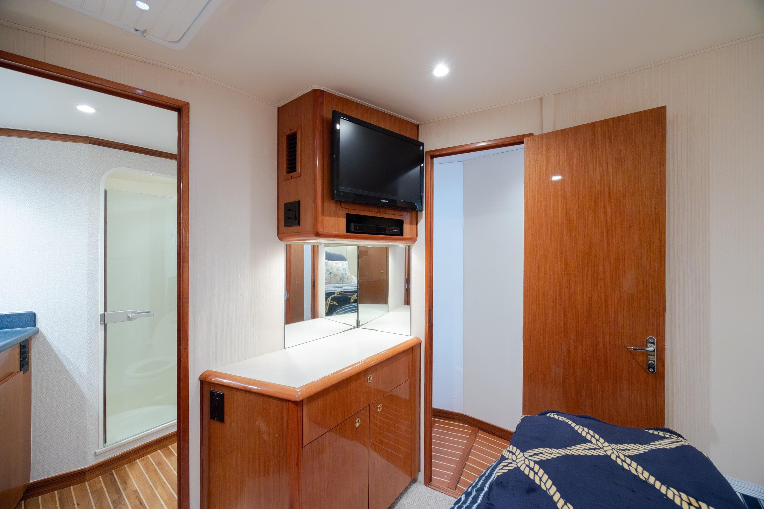 Interior of 2000 Viking 55 Convertible yacht with wood cabinetry and modern amenities.