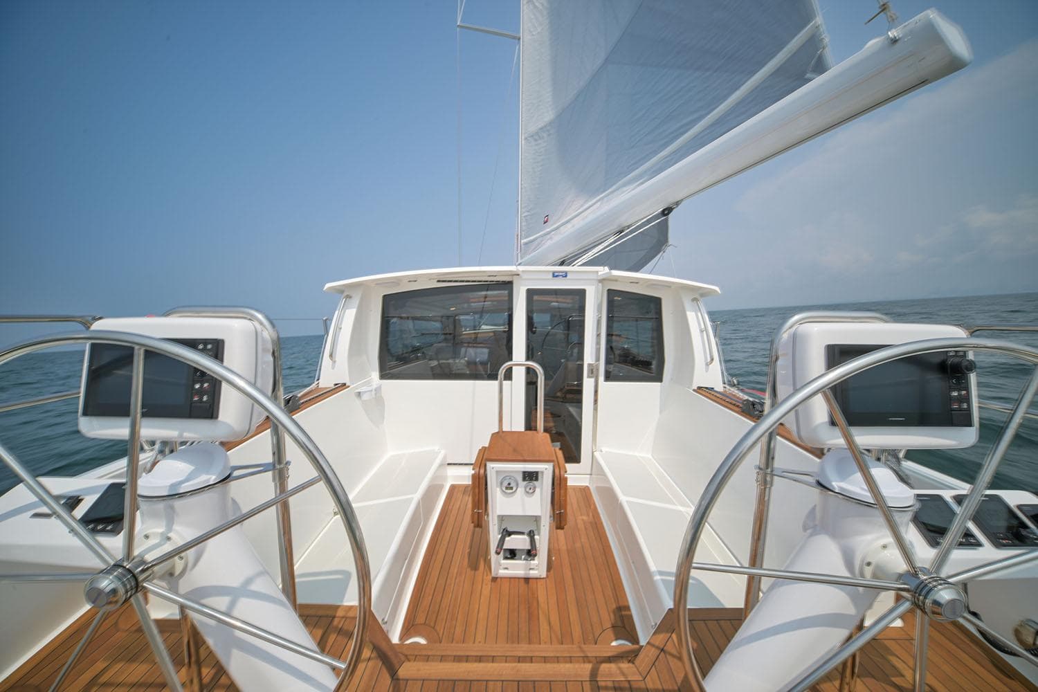 Manufacturer Provided Image: Sailing yacht Tartan 455, 2026 model, with dual steering wheels and sleek deck design.