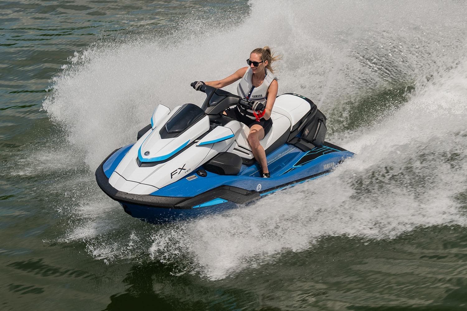 Manufacturer Provided Image: 2026 Yamaha WaveRunner FX HO jet ski speeding on water with rider.