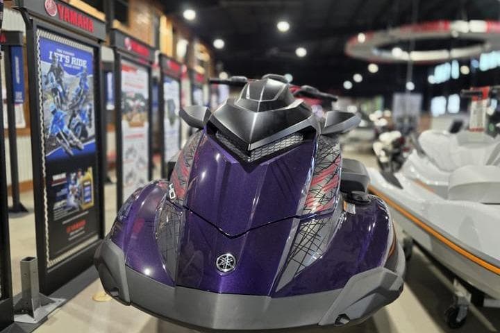 2026 Yamaha WaveRunner GP HO in showroom, featuring sleek purple design and advanced technology.
