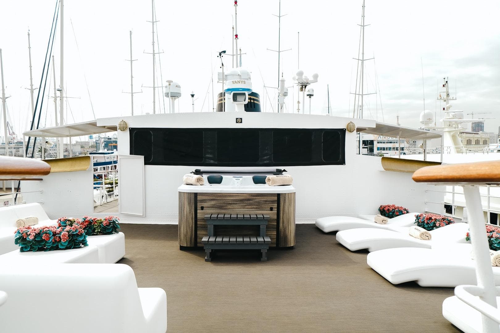 Luxurious yacht deck with sun loungers and floral arrangements, Jadranska Linjska Plovidba, 1954 model.
